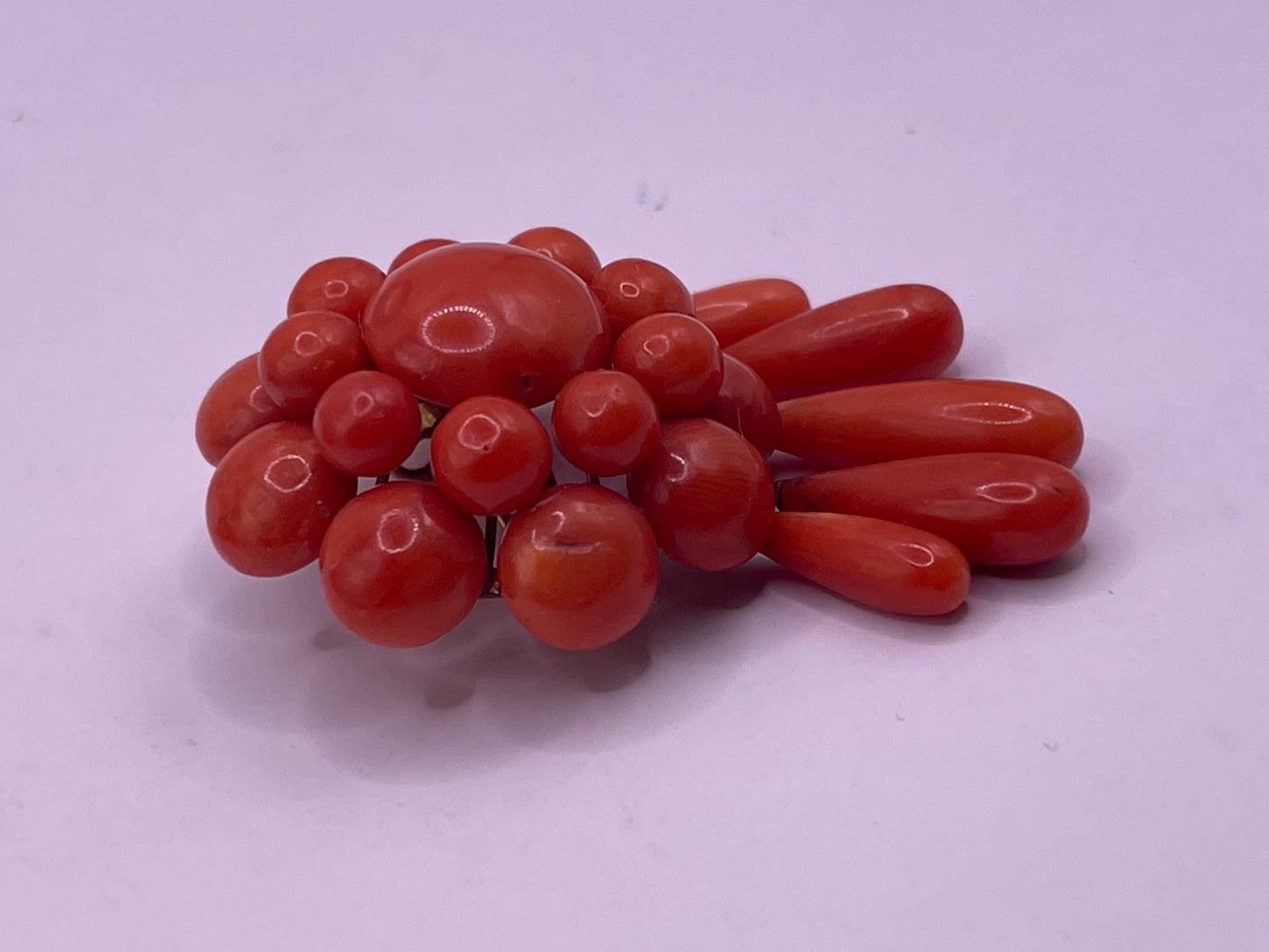 A natural untreated coral orange/ pink pin/ pendant
