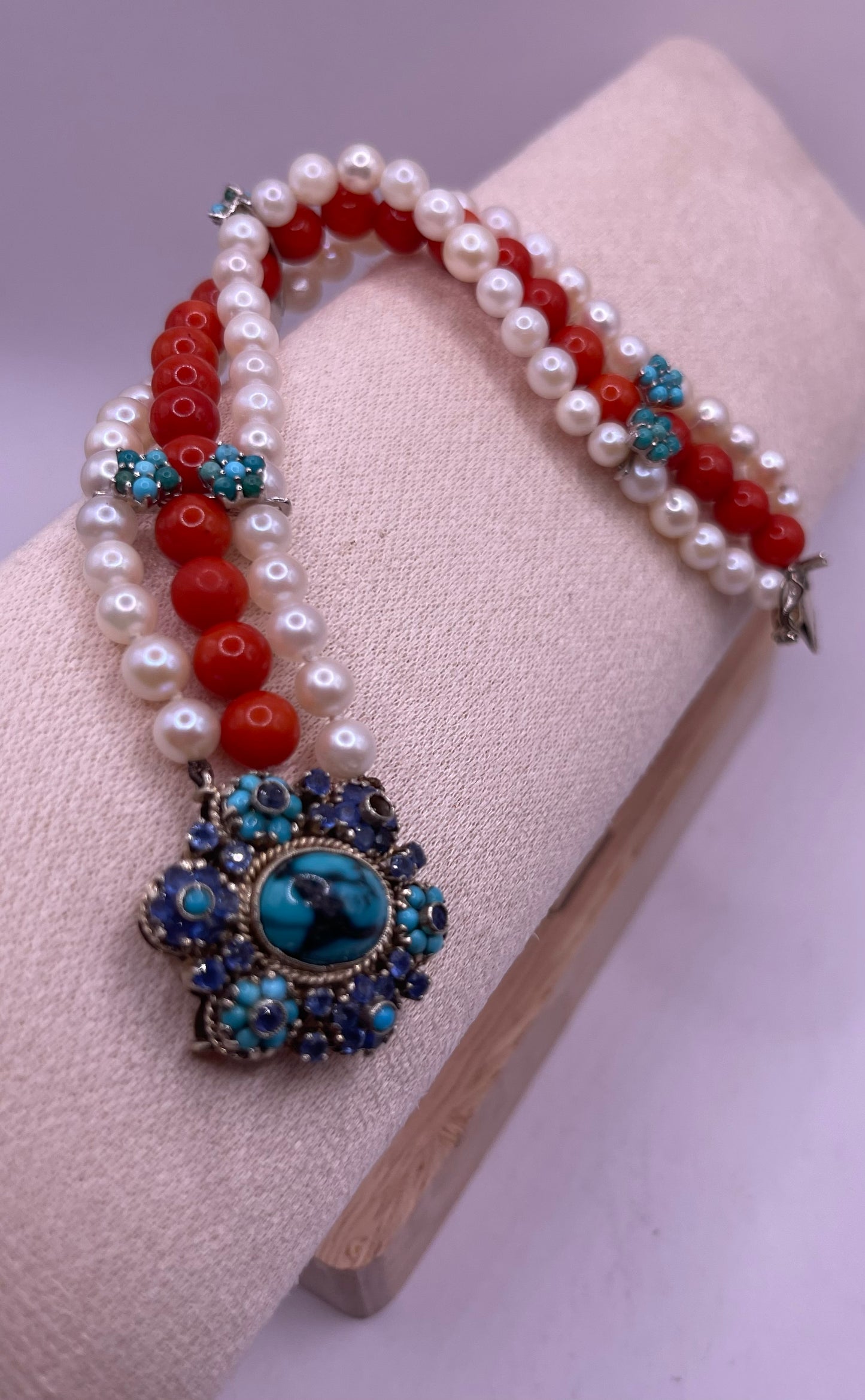 18kt gold, turquoise and sapphire, coral and pearl bracelet