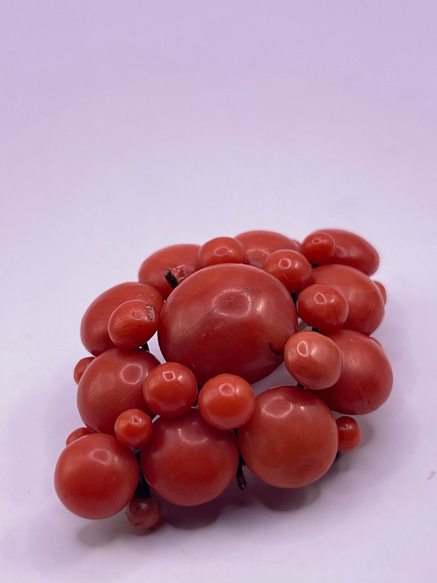 A natural untreated coral orange/ pink pin/ pendant