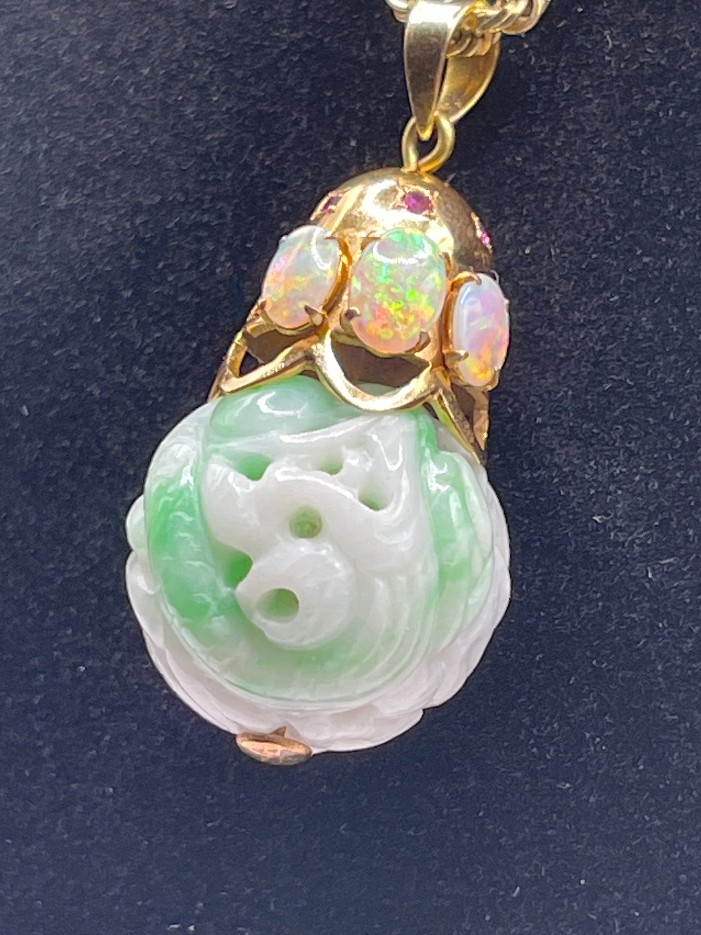 Carved shou jade bead pendant with opals and ruby