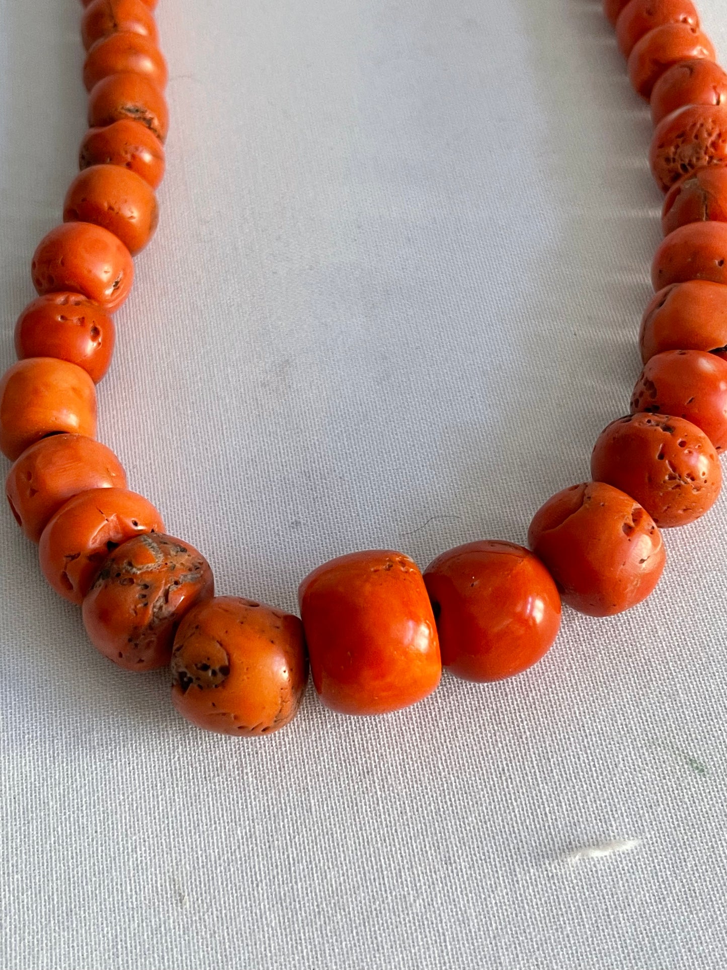 A necklace with antique coral beads