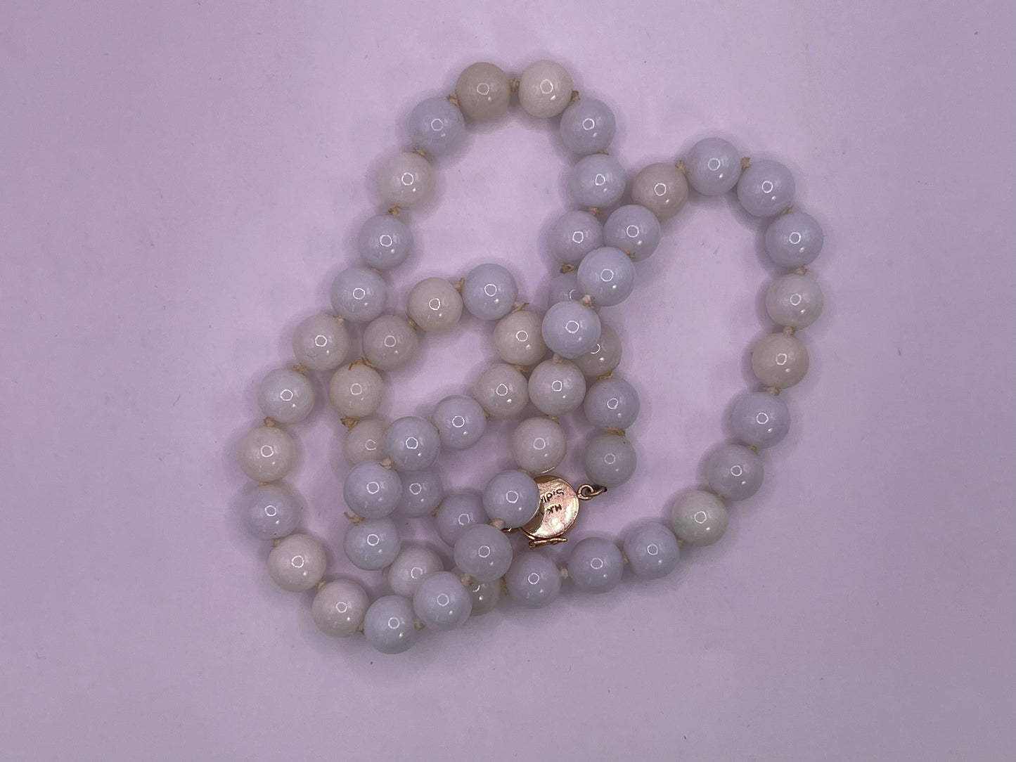 A vintage lavender jade necklace from Gumps
