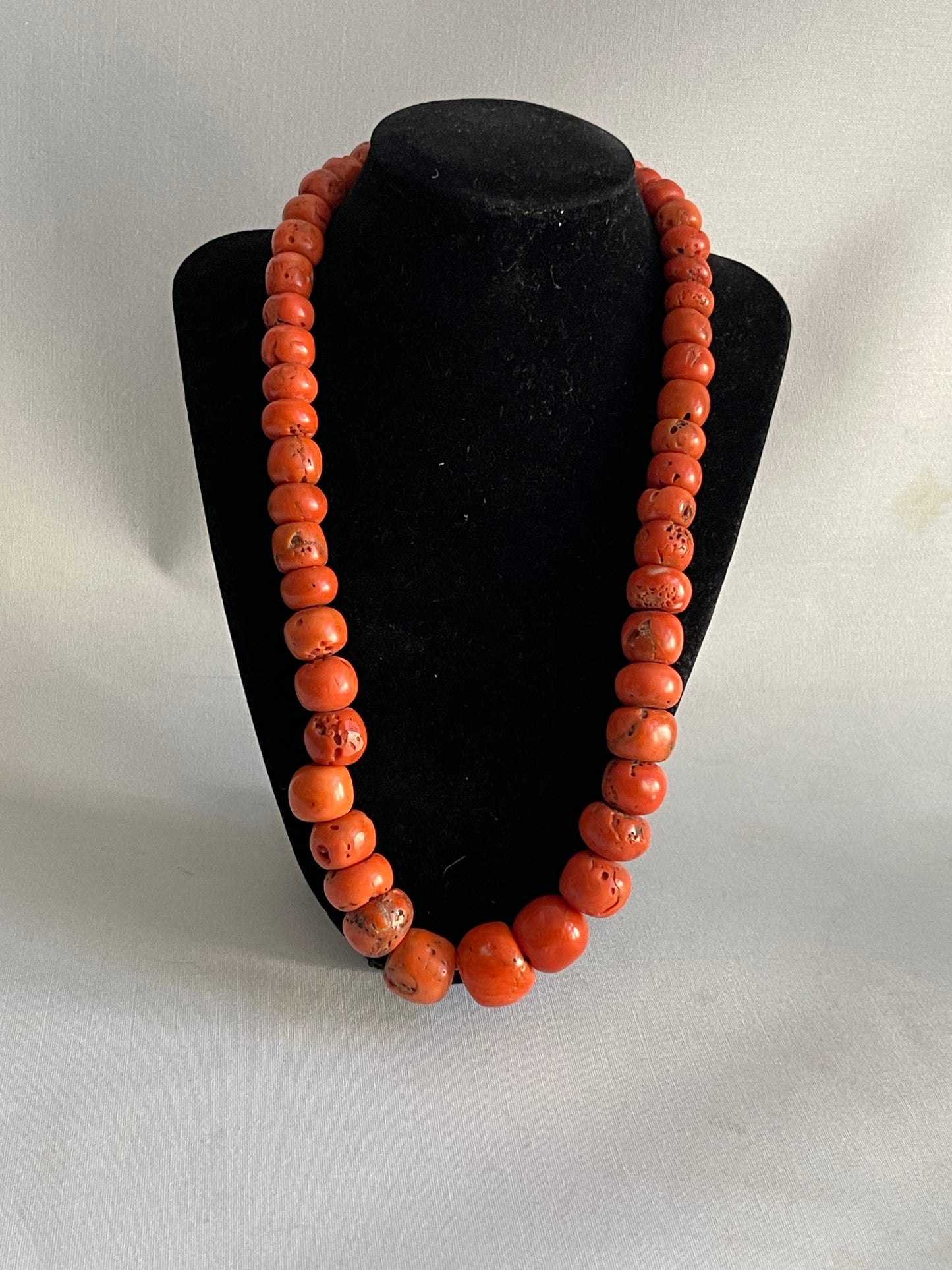 A necklace with antique coral beads