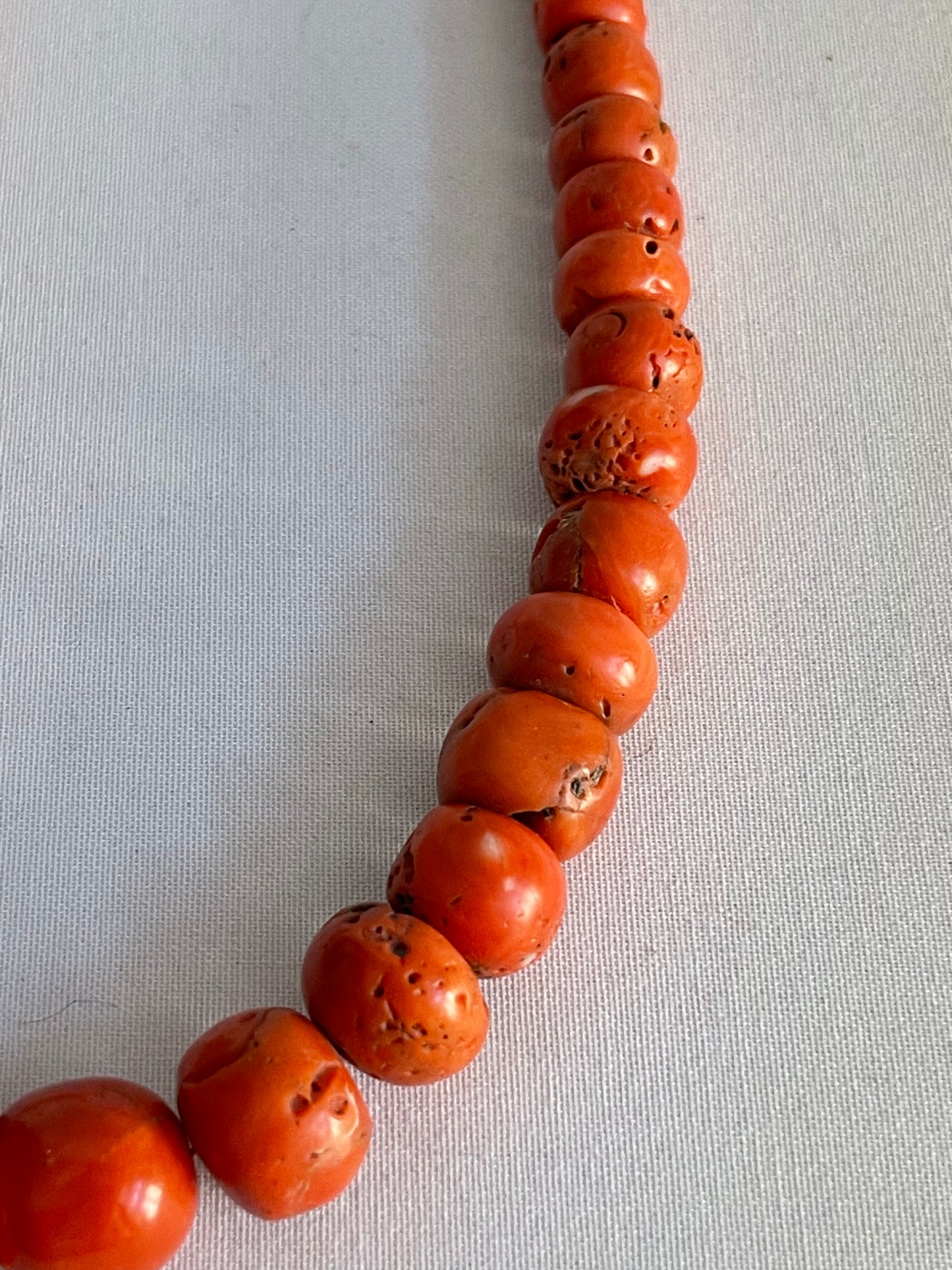A necklace with antique coral beads