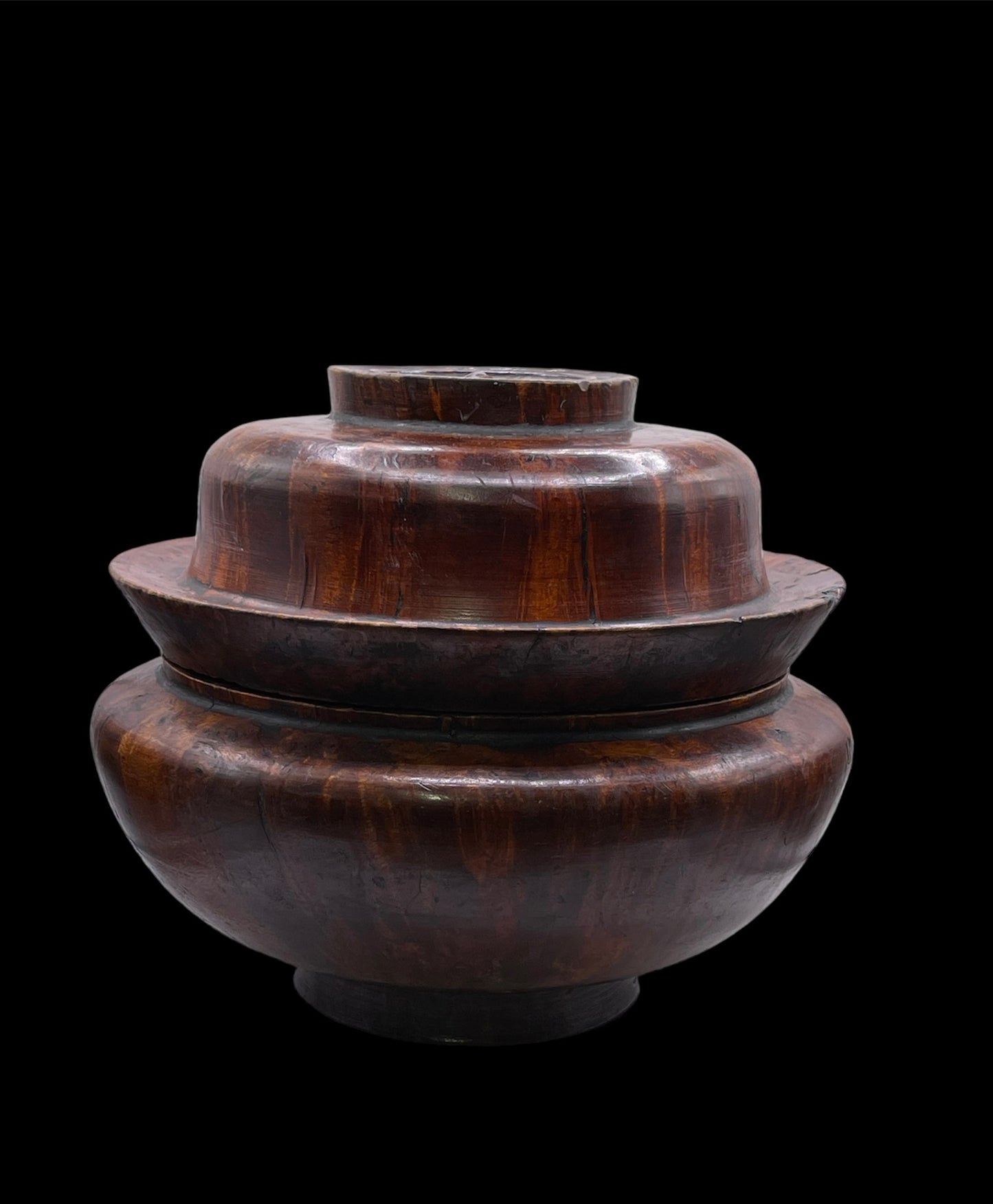 An antique burlwood tsampa container with lid