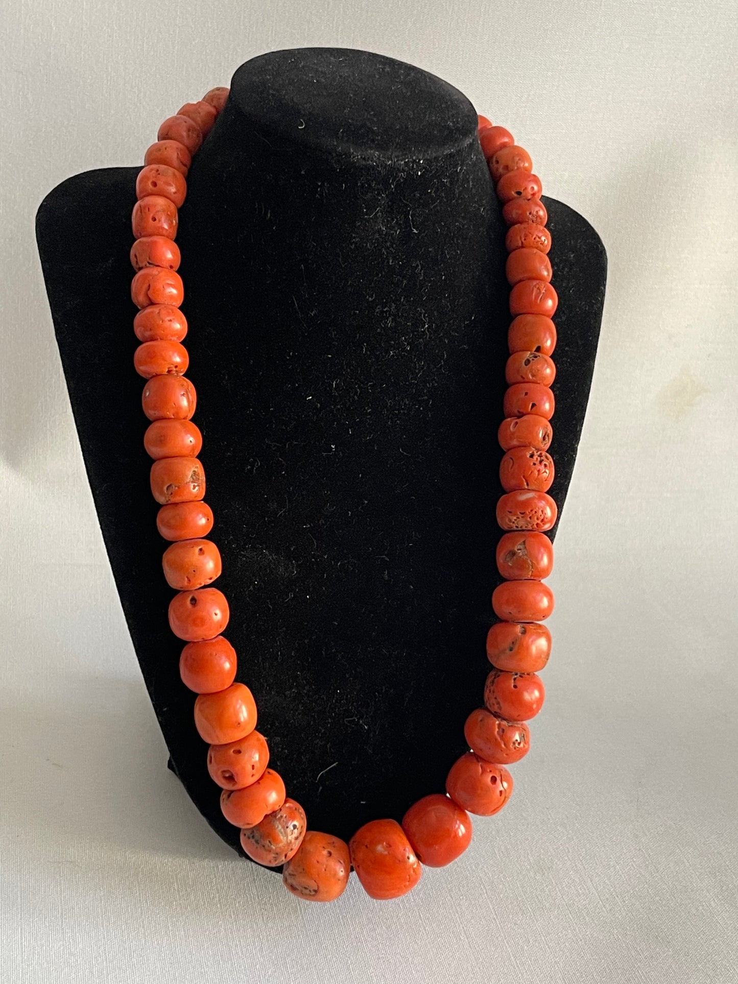 A necklace with antique coral beads
