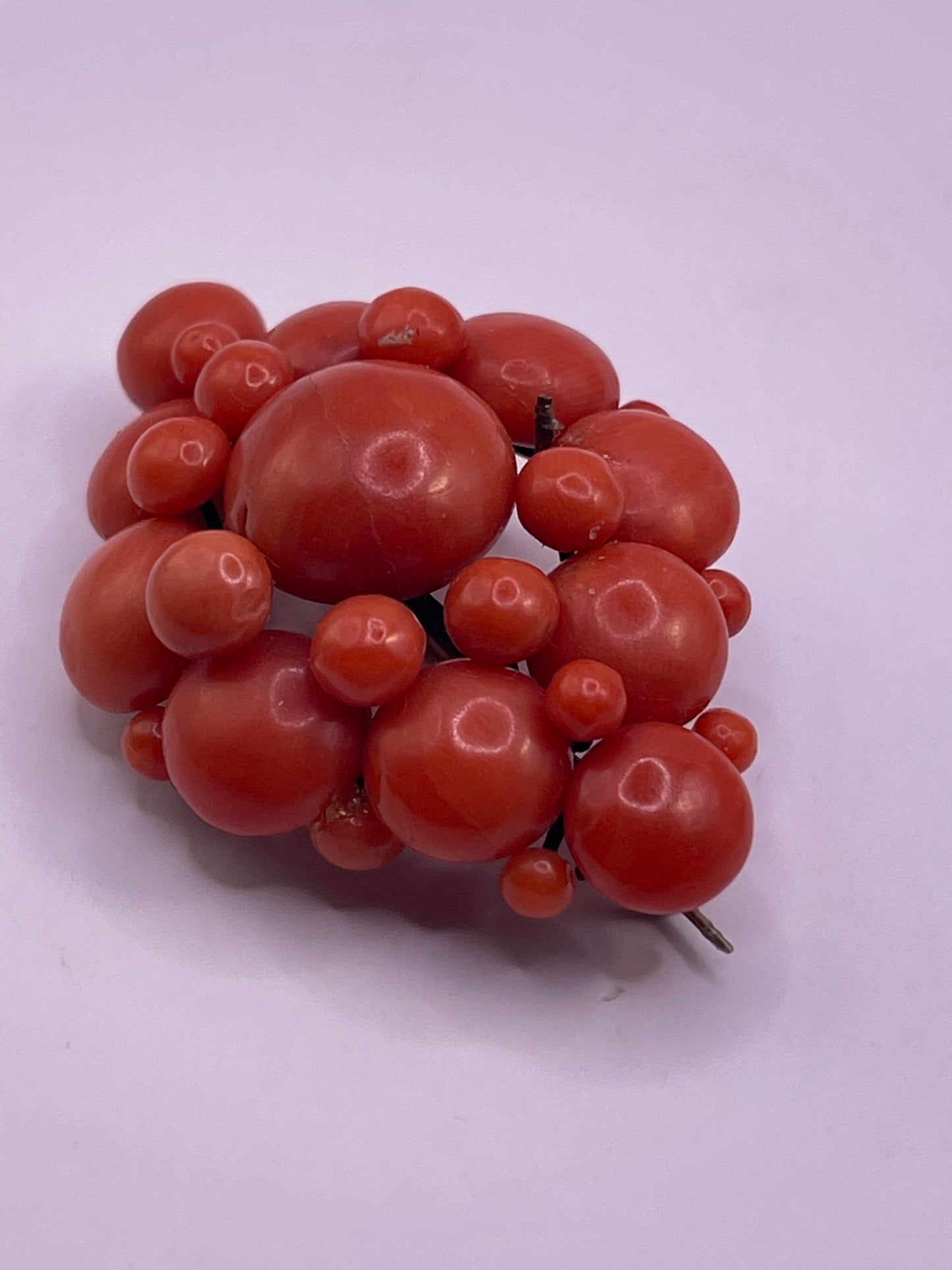 A natural untreated coral orange/ pink pin/ pendant