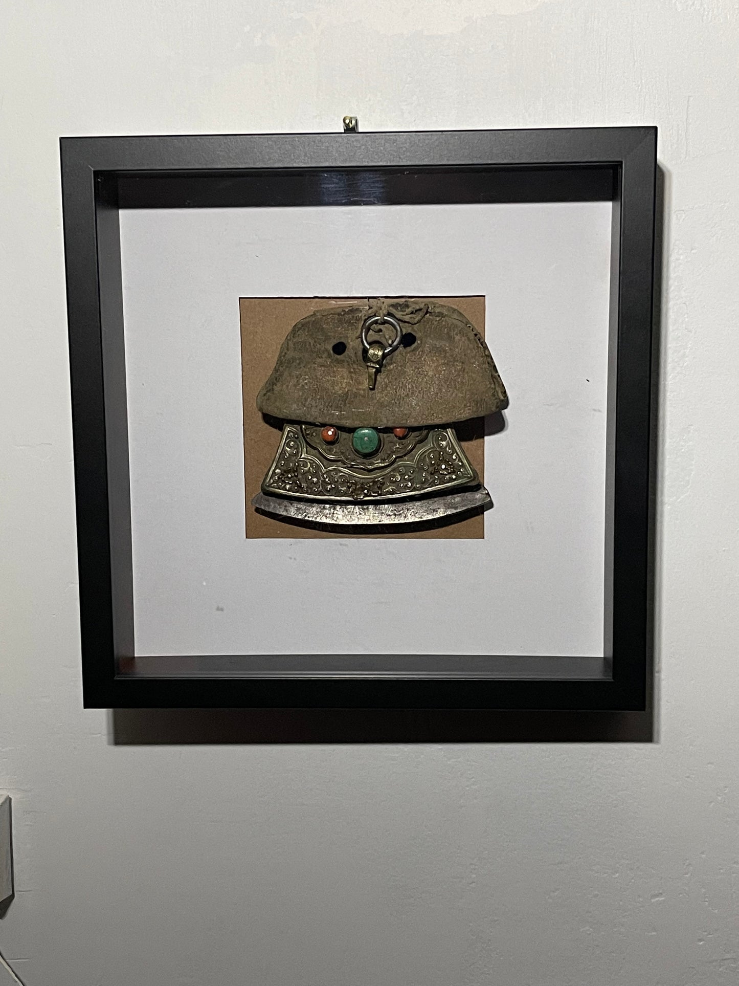 An antique framed Tibetan mechak- flint purse with leather cover