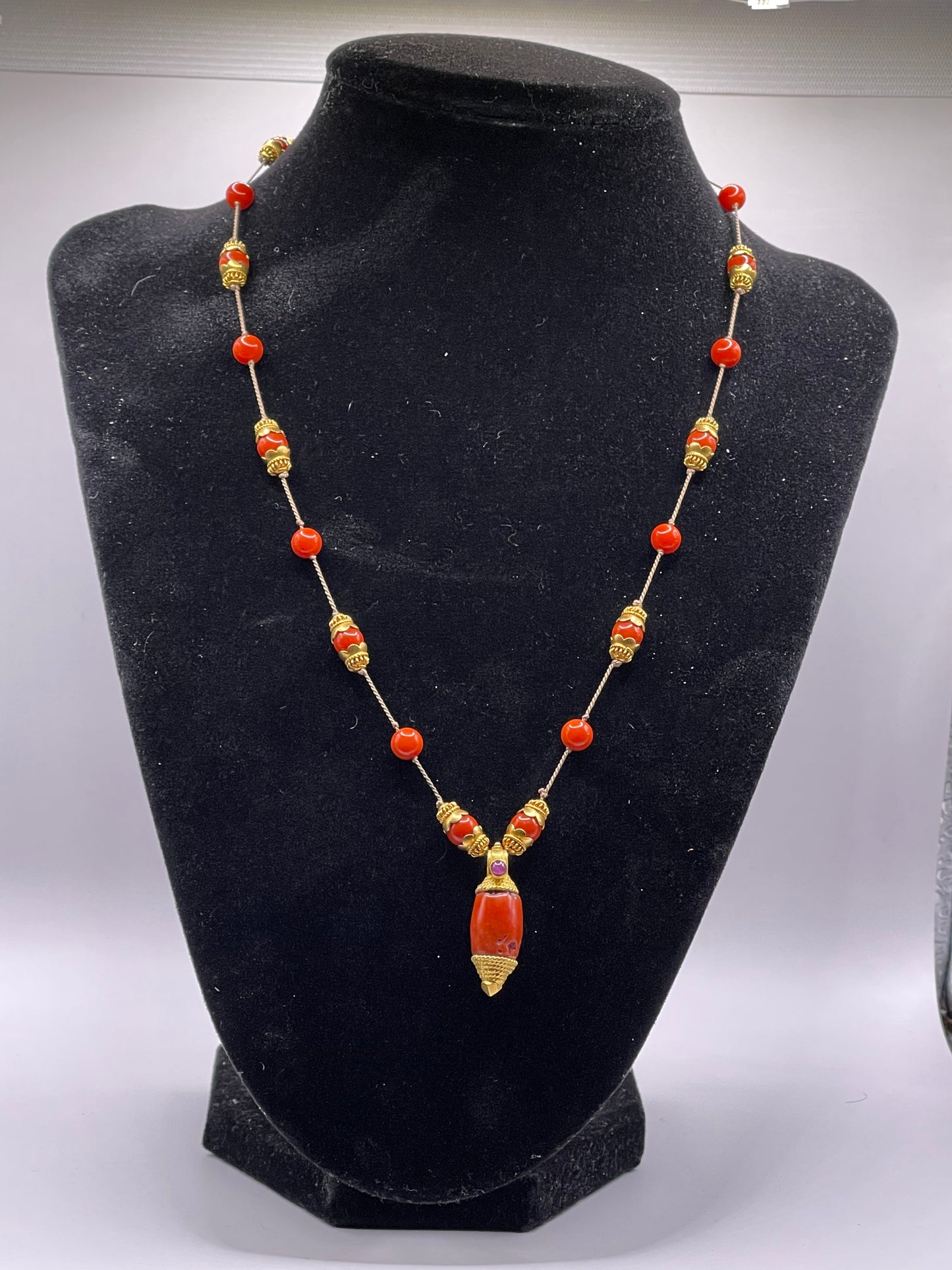 A 18kt gold and coral necklace