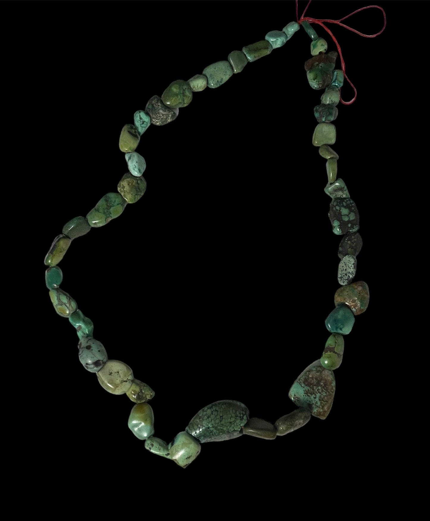 A necklace with antique Tibetan turquoise from an antique Perak
