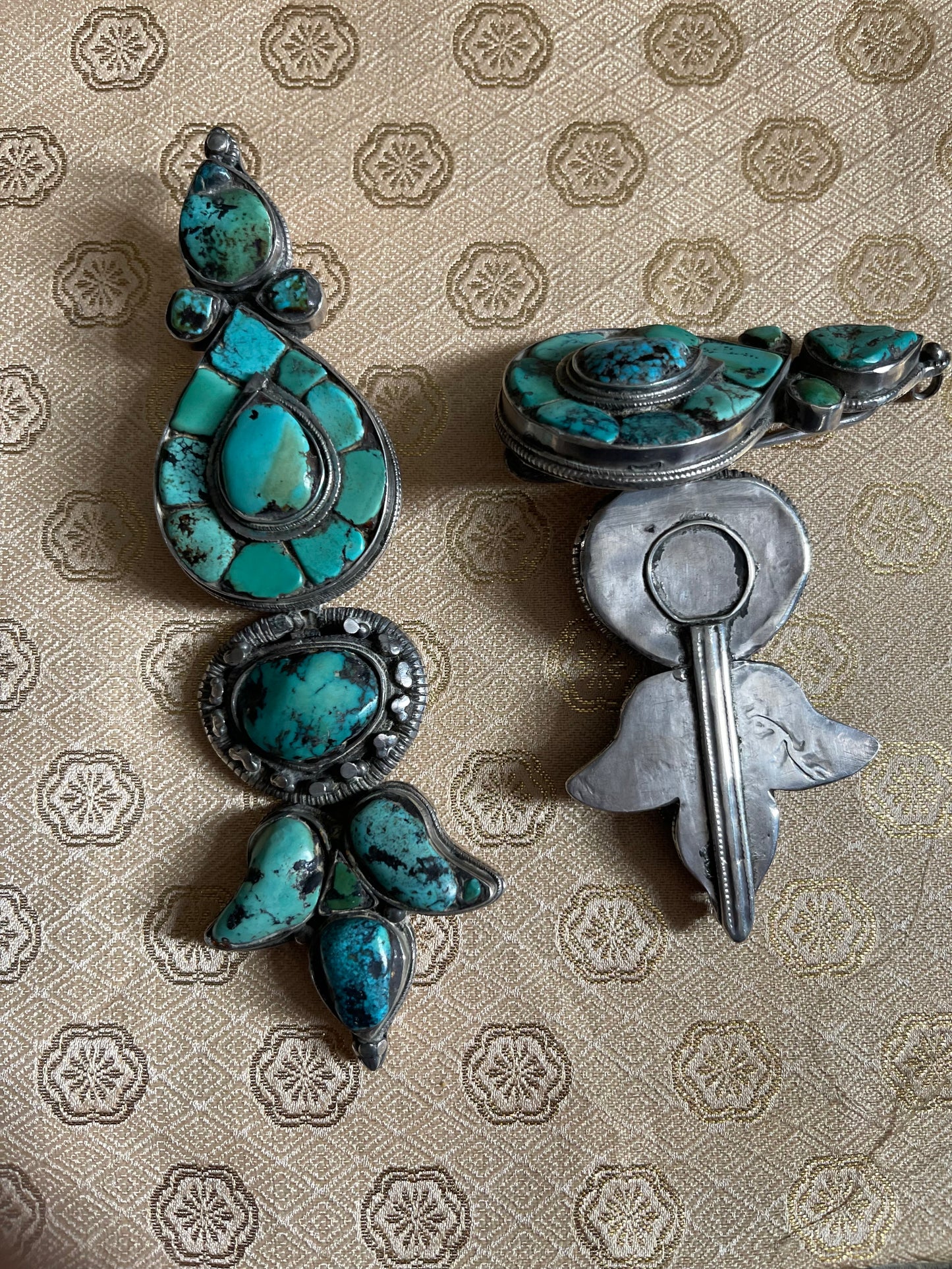 Pair of antique turquoise and silver Tibetan ear pendant / earring