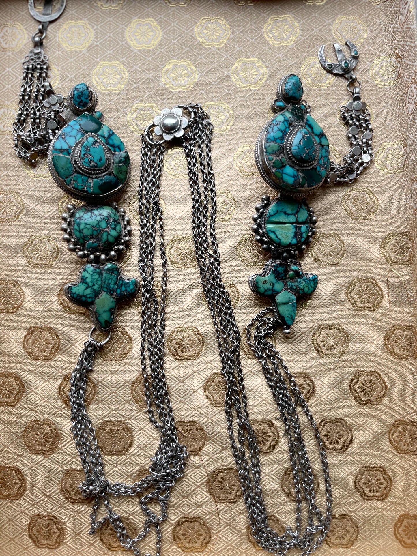 A pair of antique Tibetan earrings -aykhor