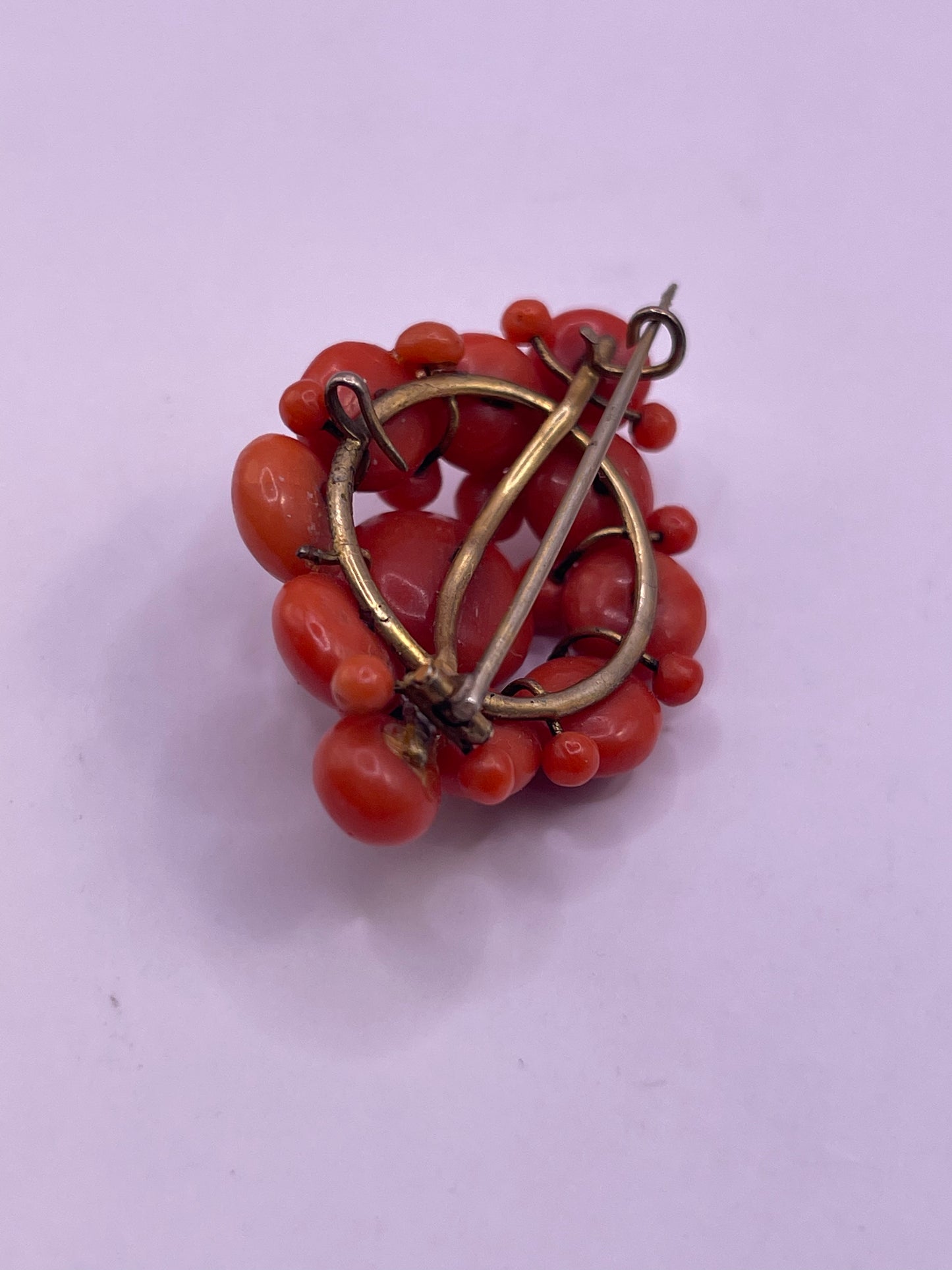 A natural untreated coral orange/ pink pin/ pendant