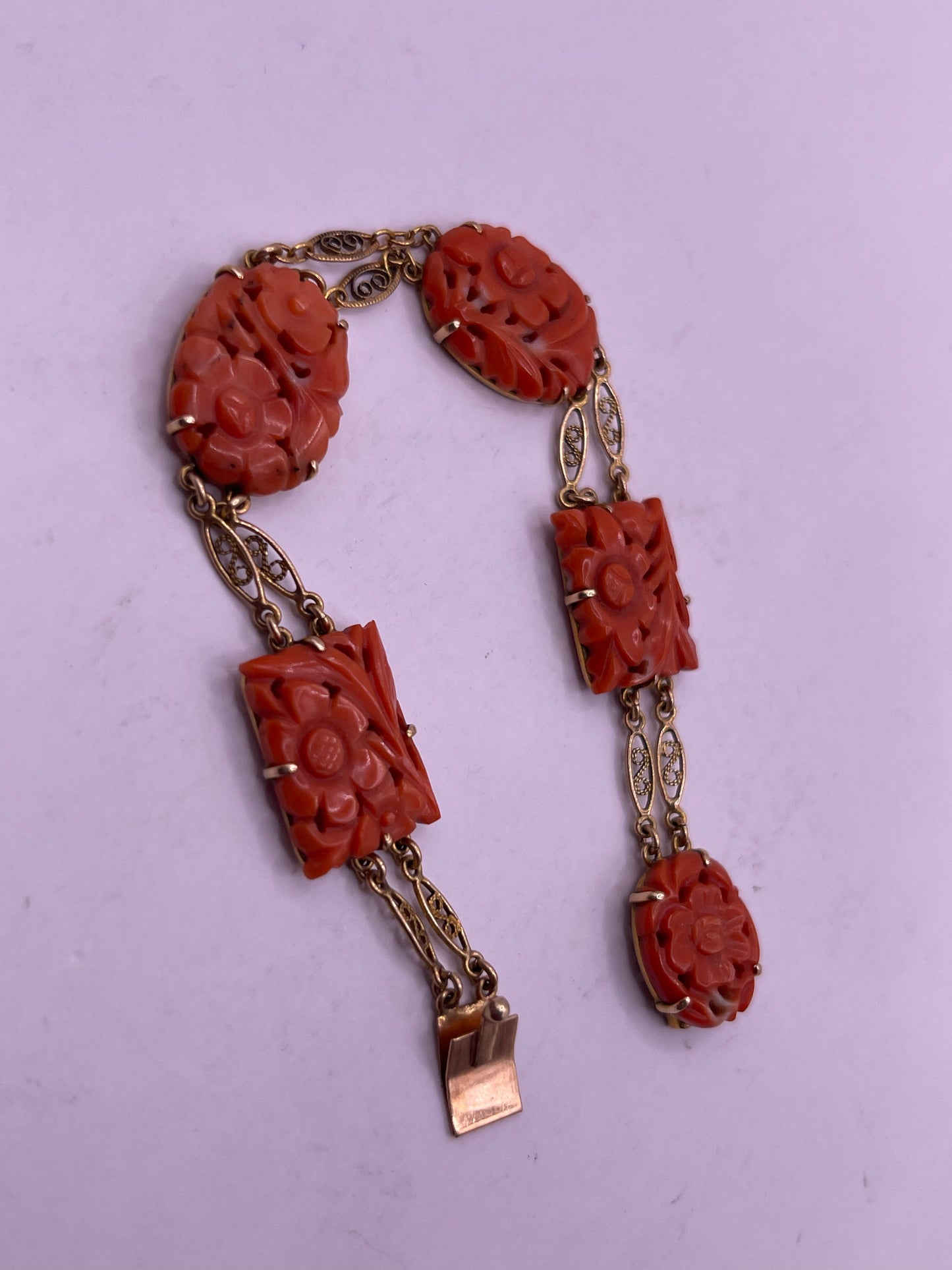 A coral plaque 14kt bracelet