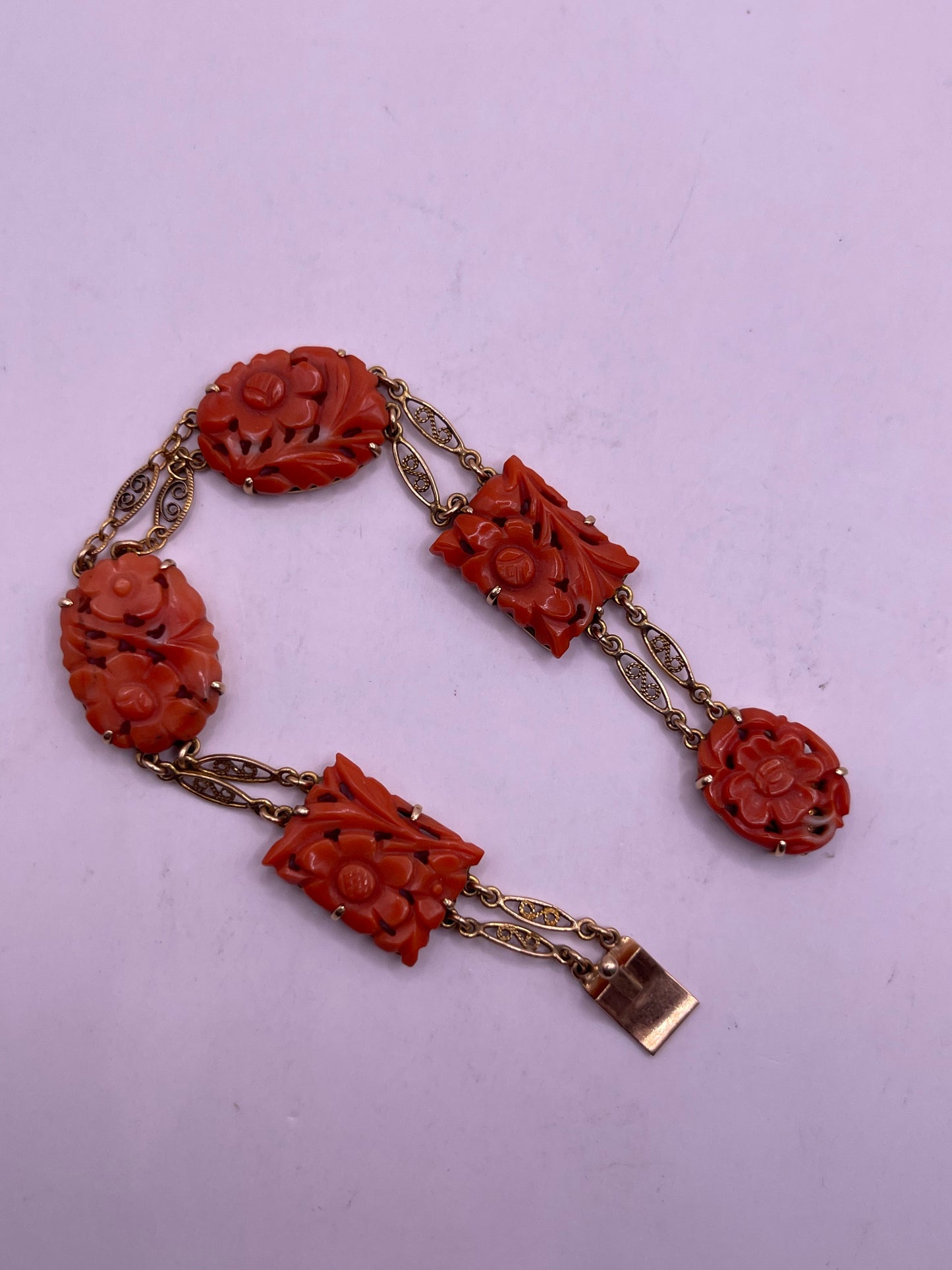 A coral plaque 14kt bracelet