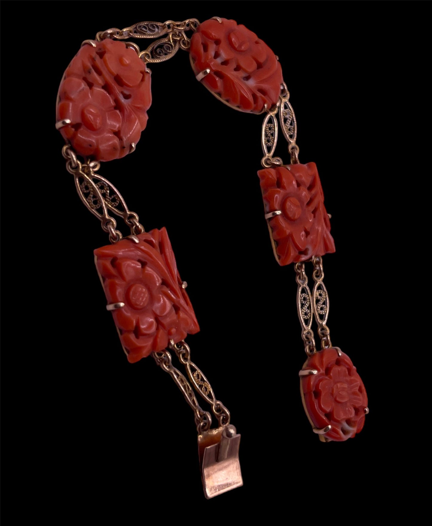 A coral plaque 14kt bracelet