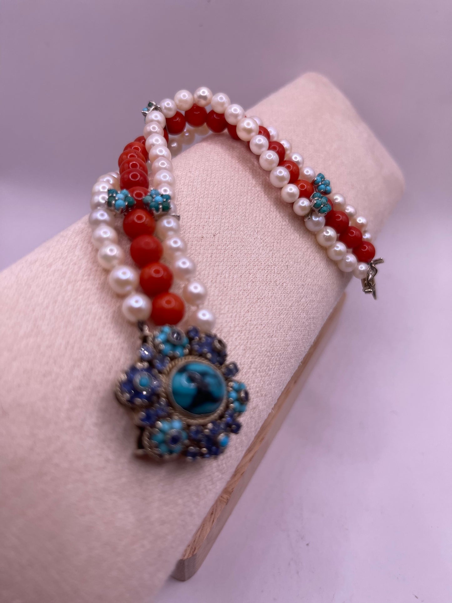18kt gold, turquoise and sapphire, coral and pearl bracelet
