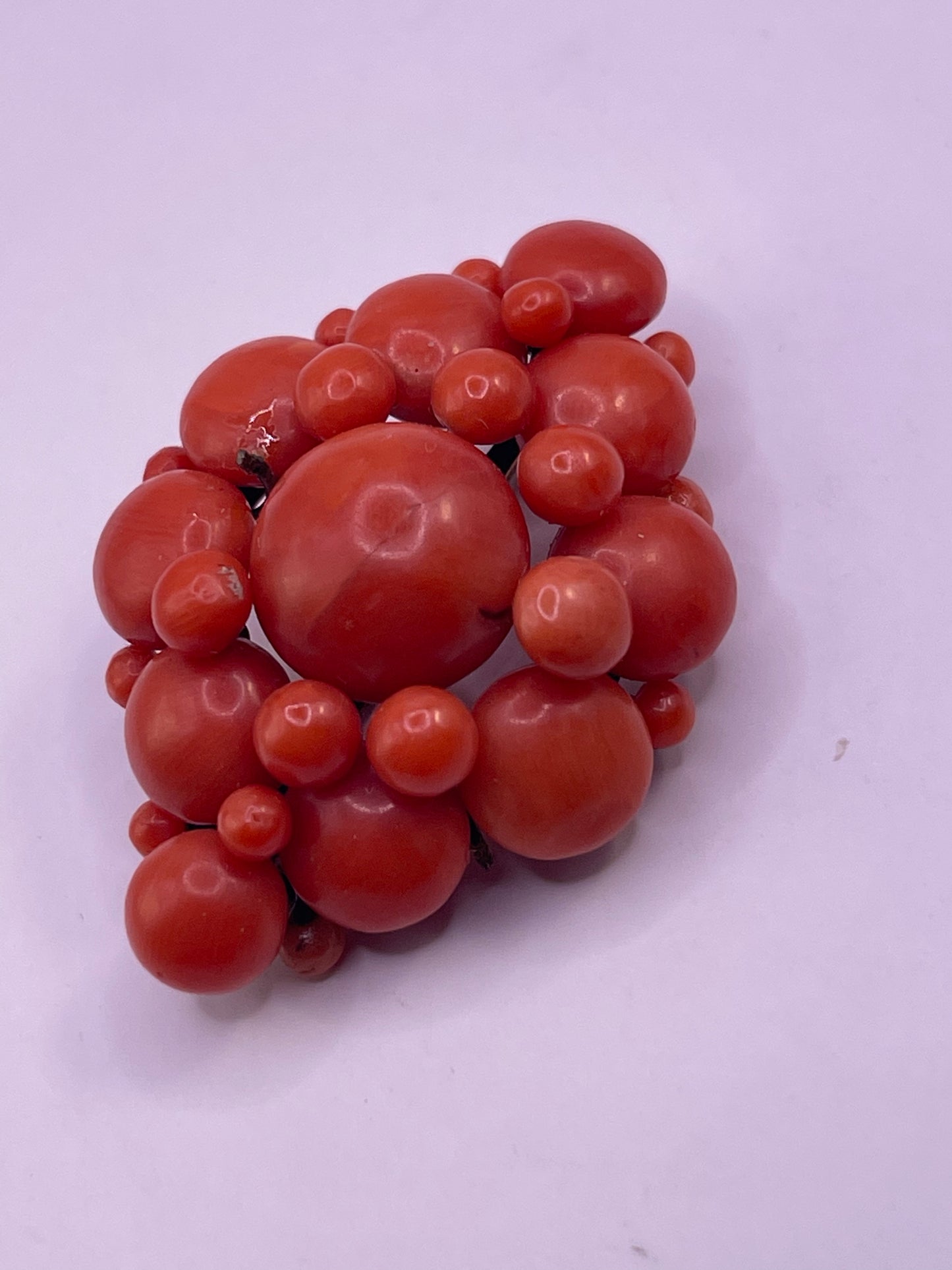 A natural untreated coral orange/ pink pin/ pendant
