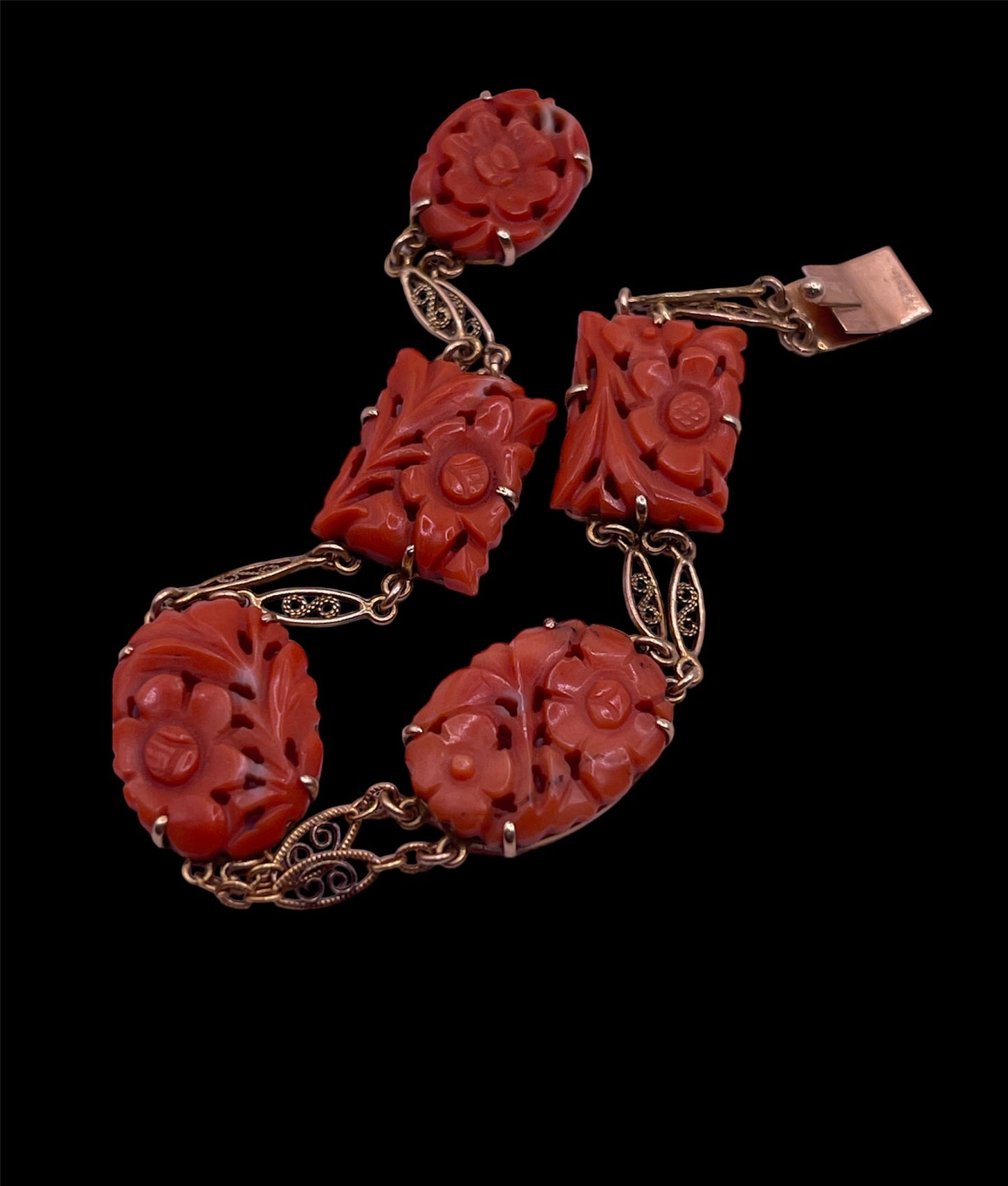 A coral plaque 14kt bracelet