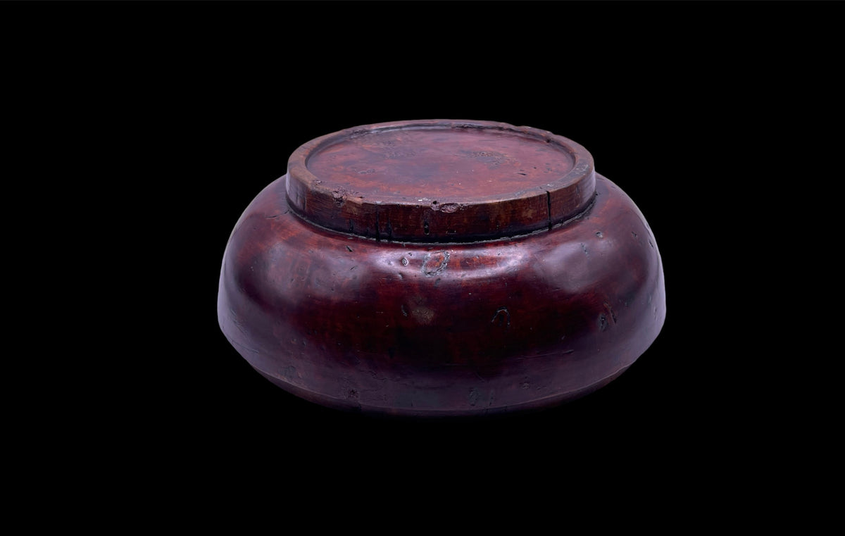 An antique burlwood tsampa bowl with cover