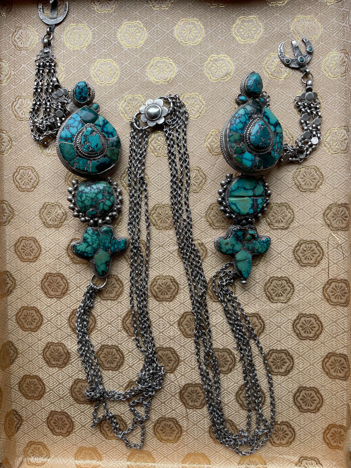 A pair of antique Tibetan earrings -aykhor