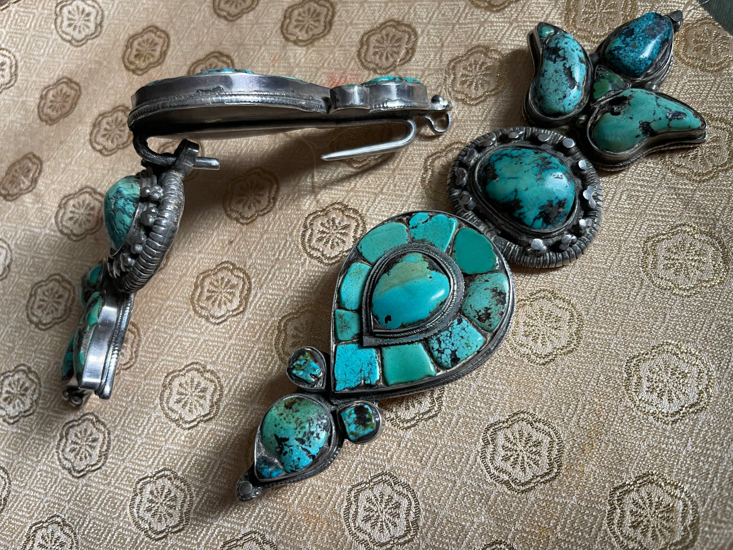 Pair of antique turquoise and silver Tibetan ear pendant / earring