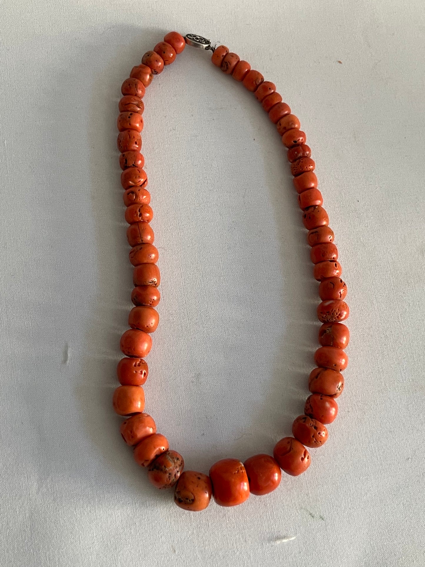 A necklace with antique coral beads