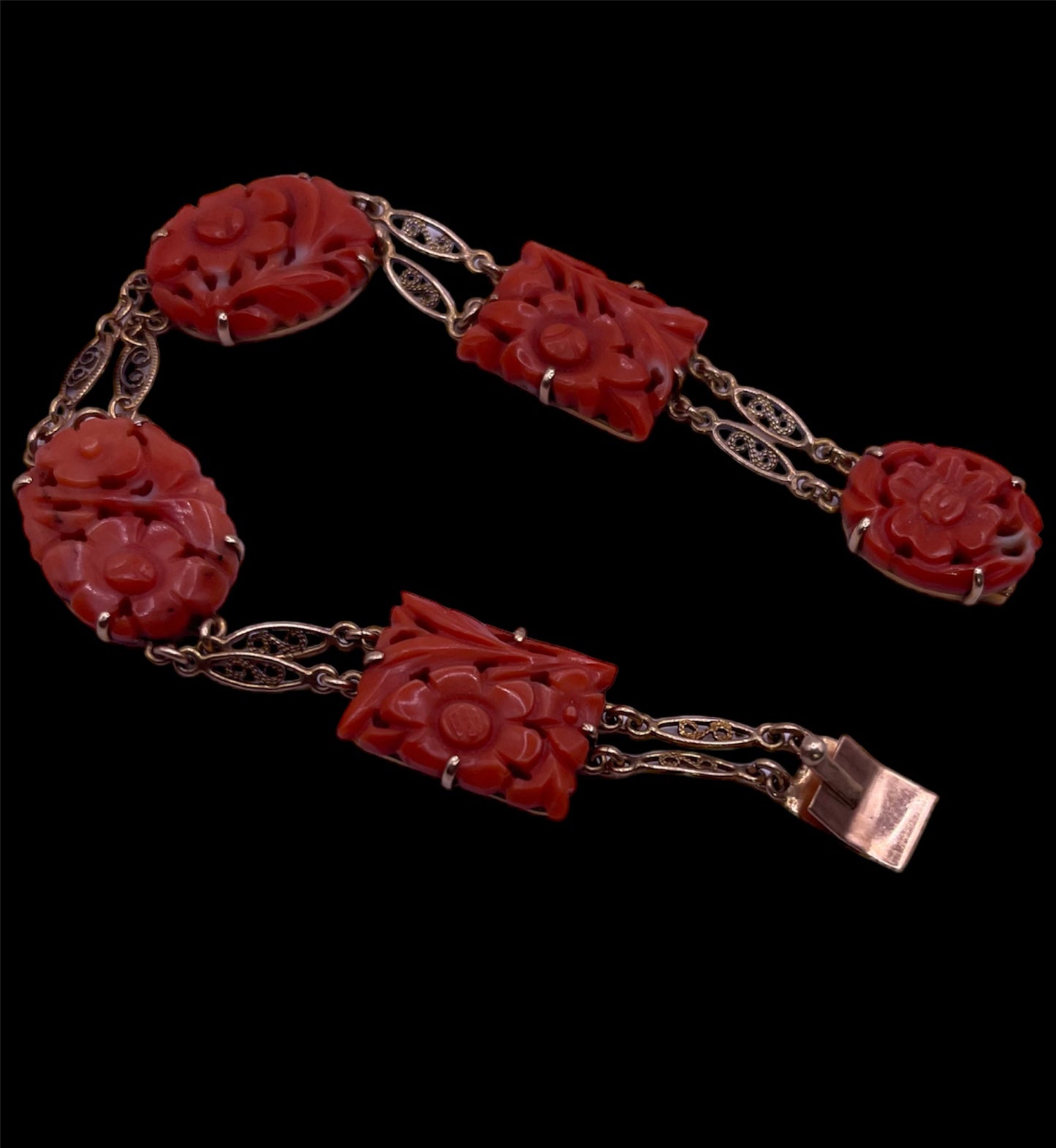 A coral plaque 14kt bracelet
