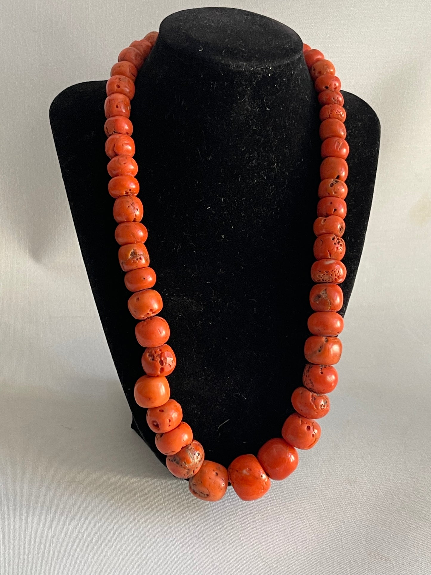 A necklace with antique coral beads
