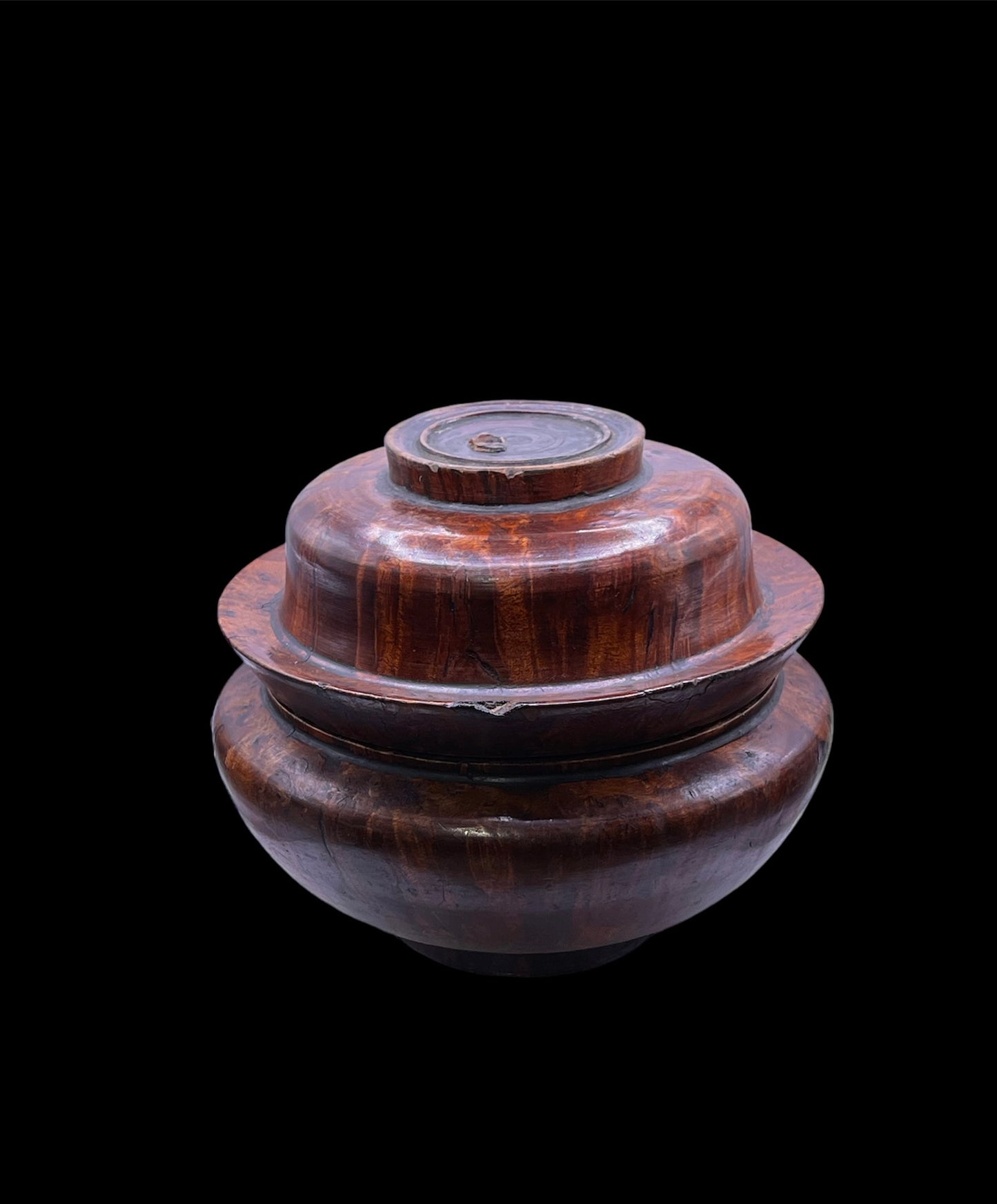 An antique burlwood tsampa container with lid