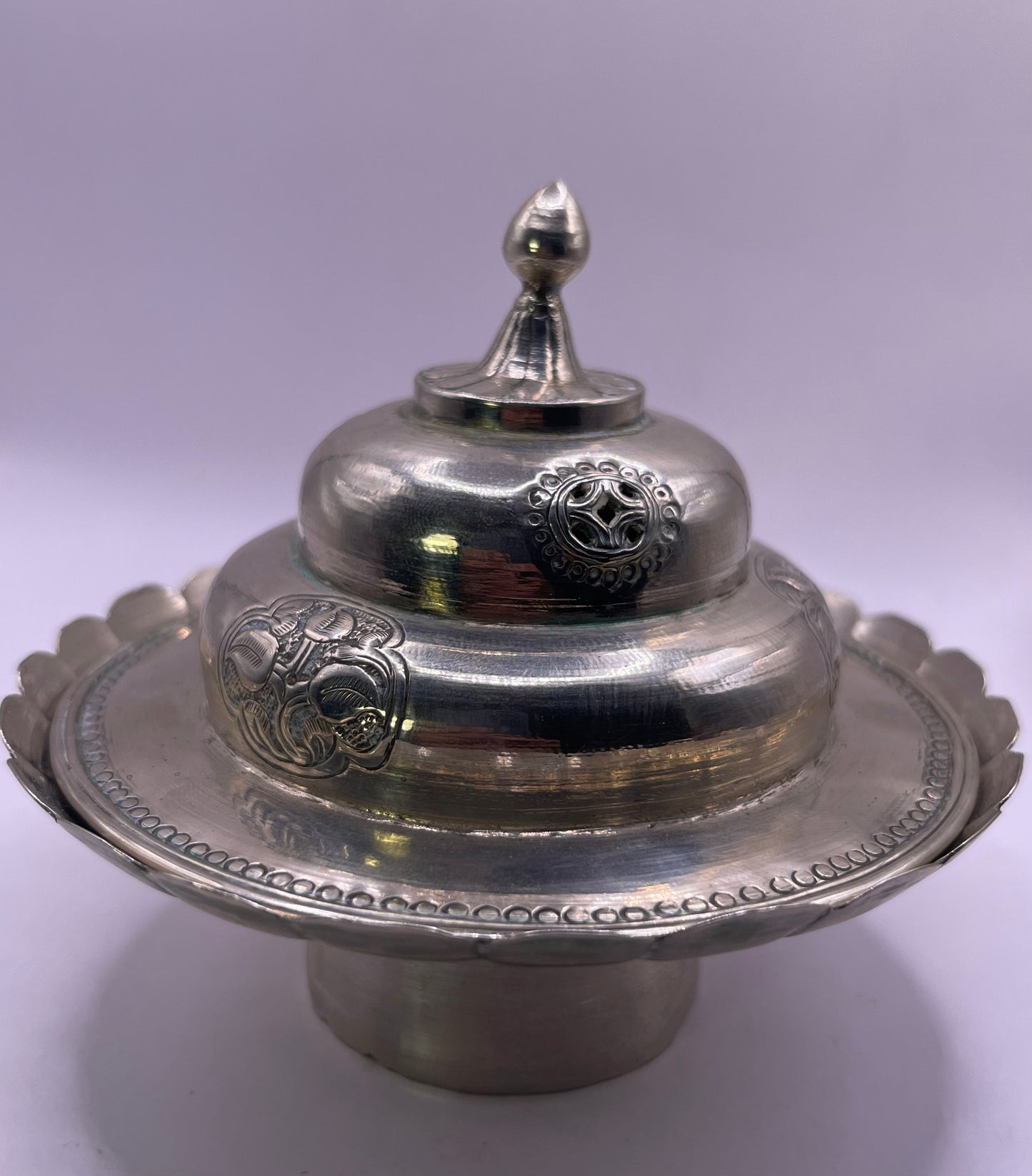 Pair of Antique silver Tibetan cup stands