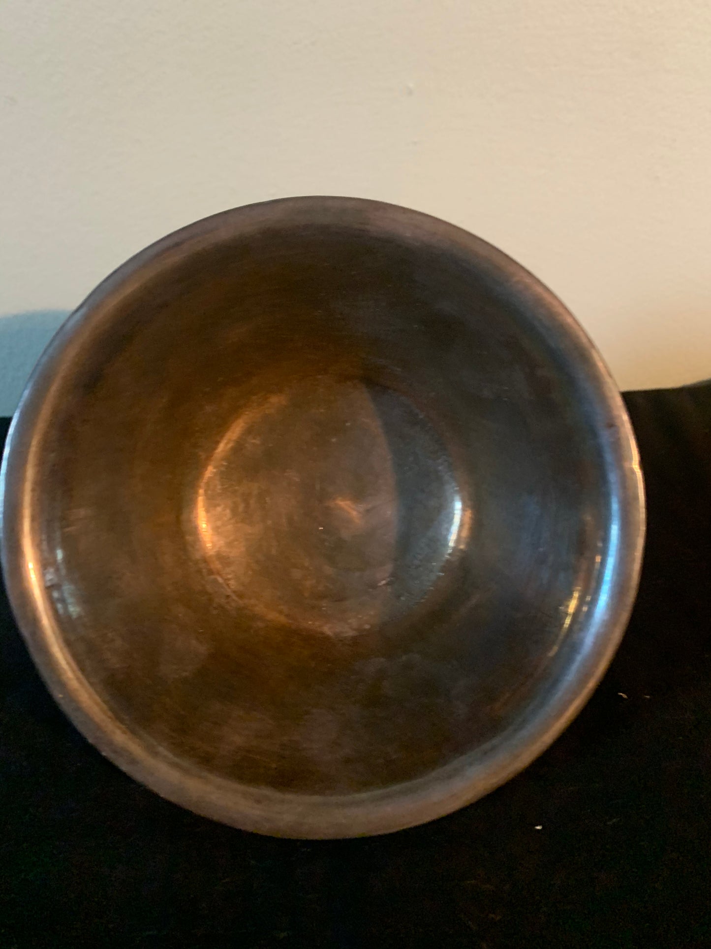 A jade bowl with silver details