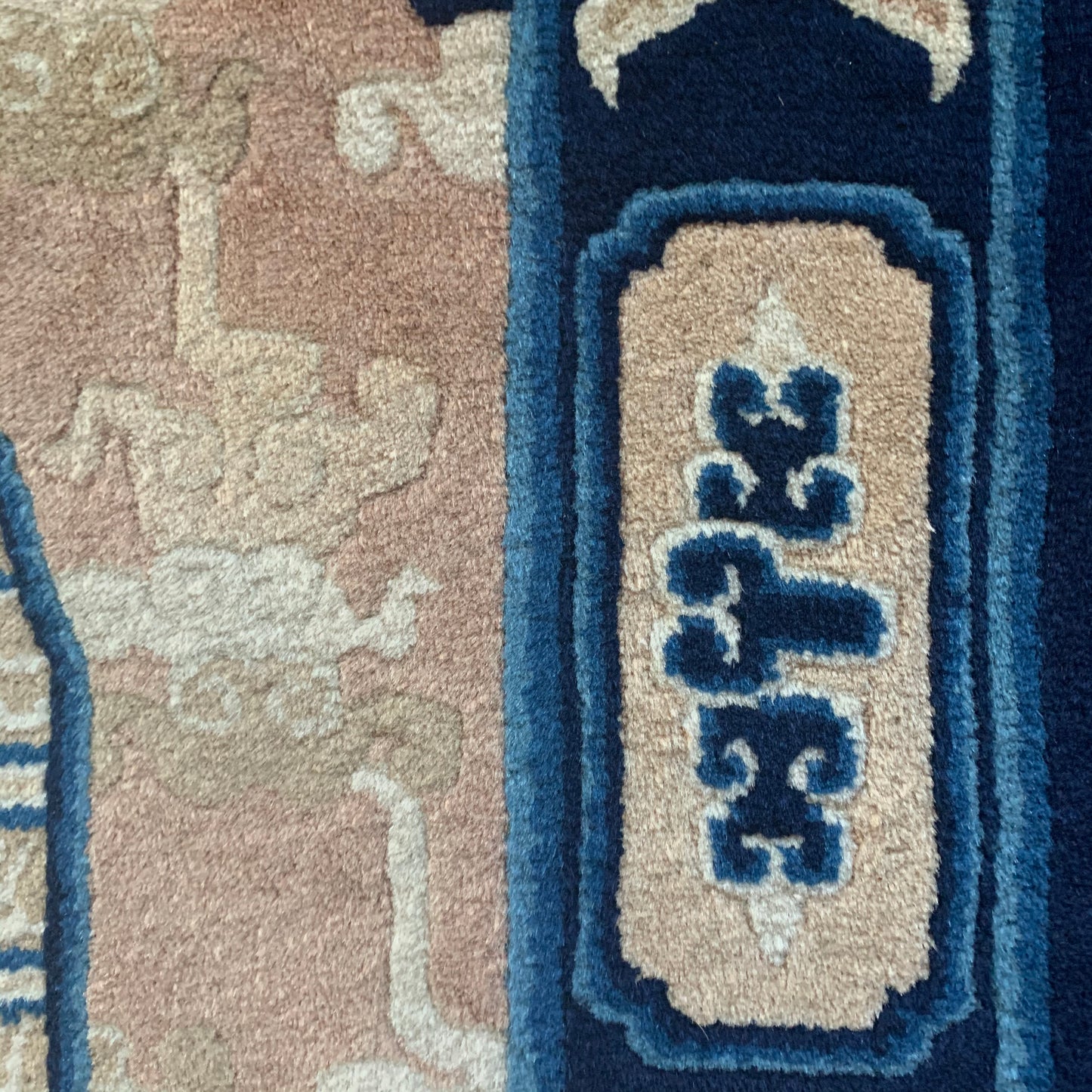 An antique ningxia dragon rug