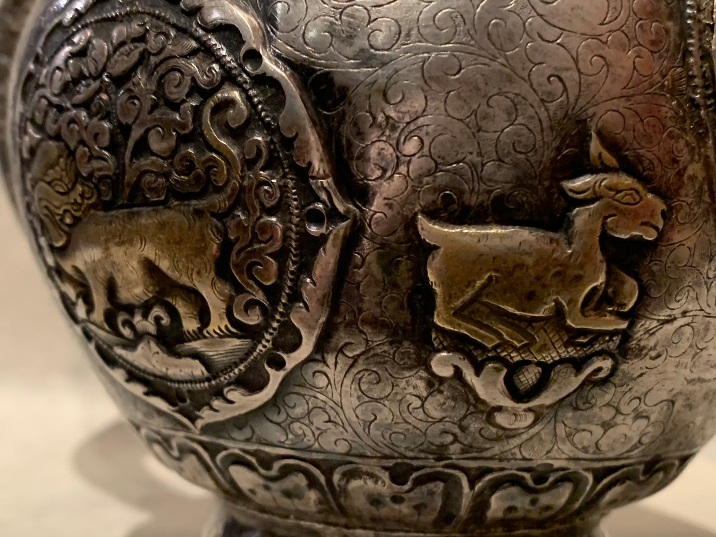 An antique silver and gilt ceremonial Tibetan teapot