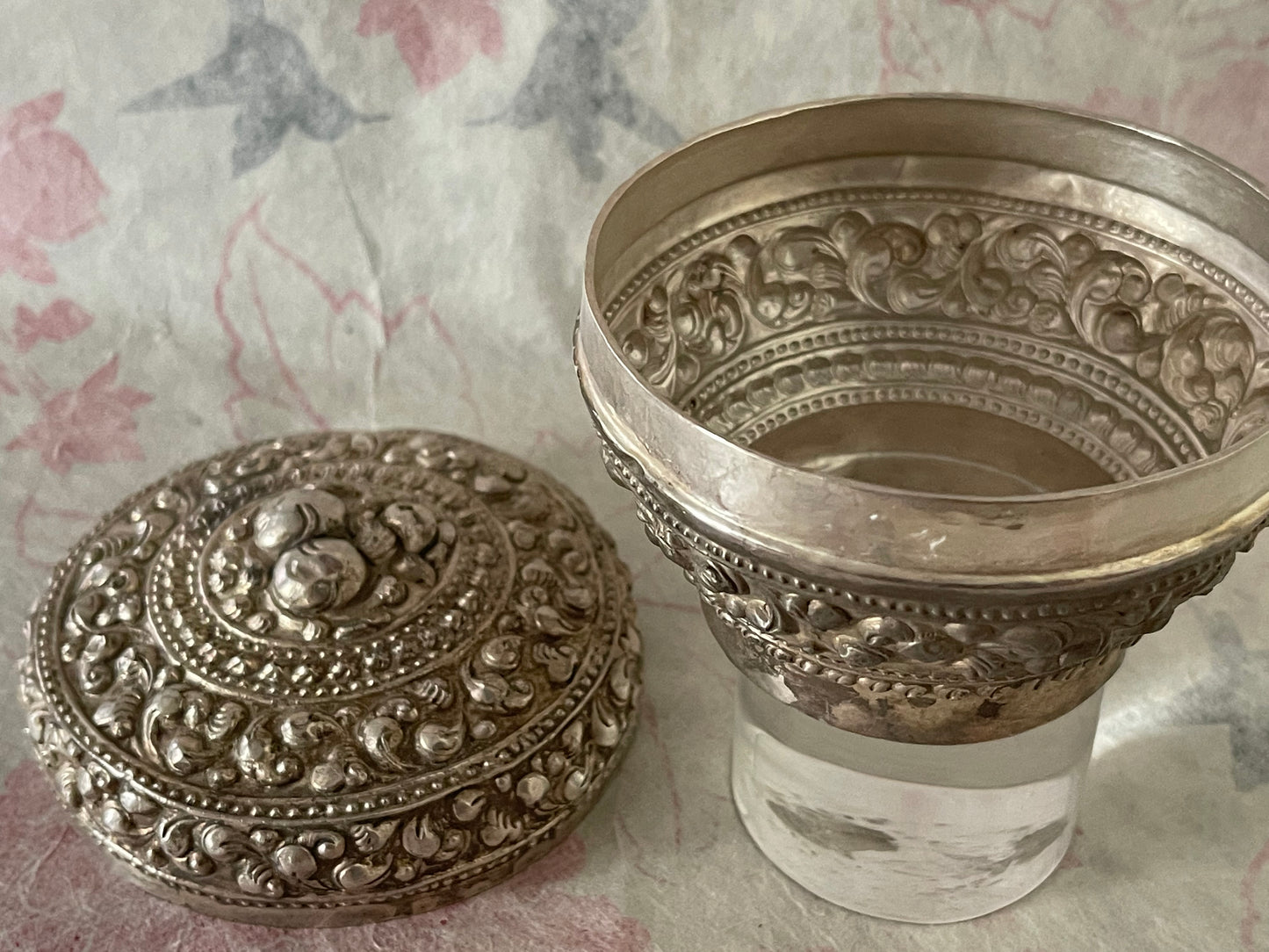 An antique silver south East Asian round box with lid