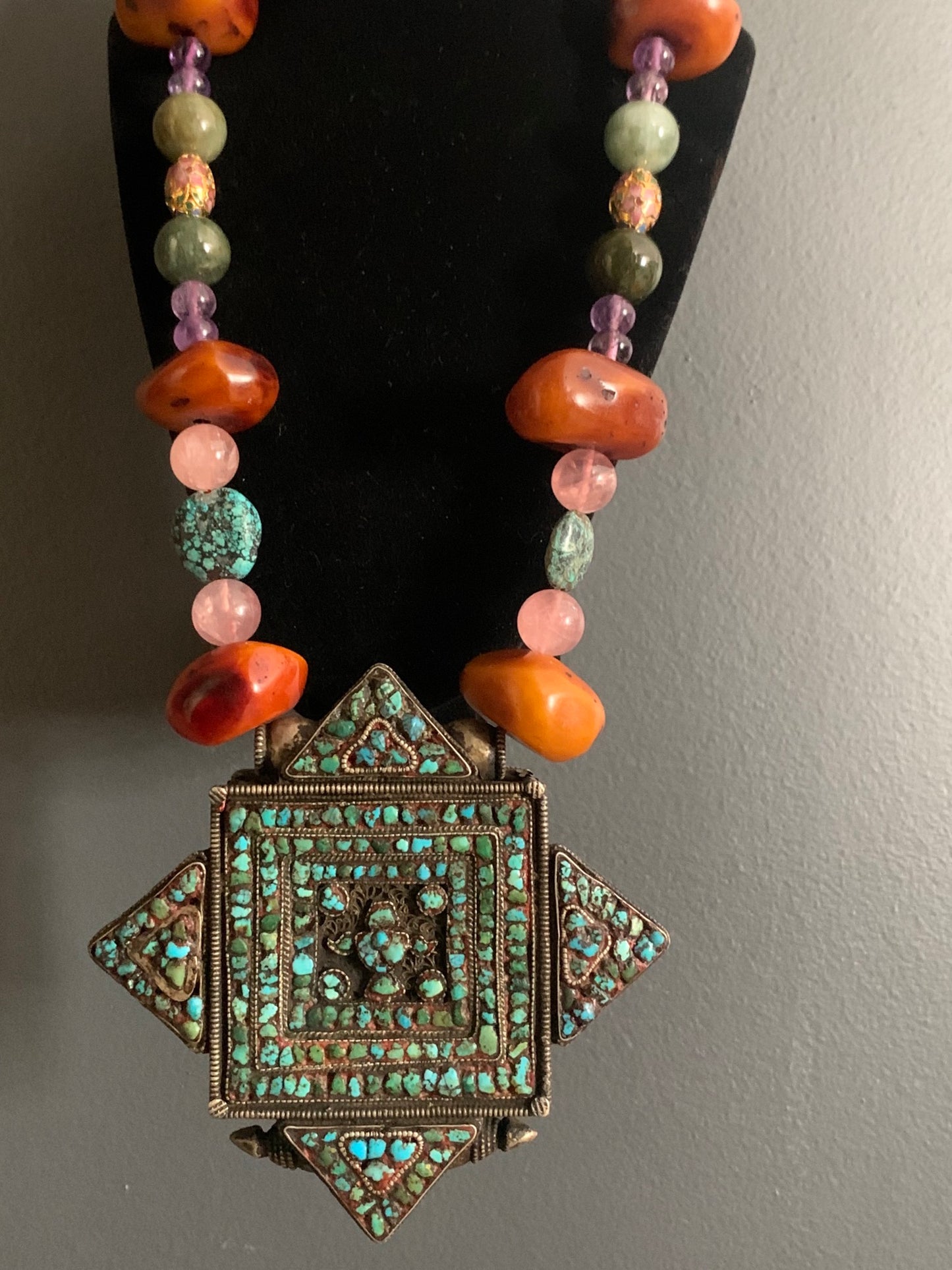 A vintage Tibetan ghau necklace