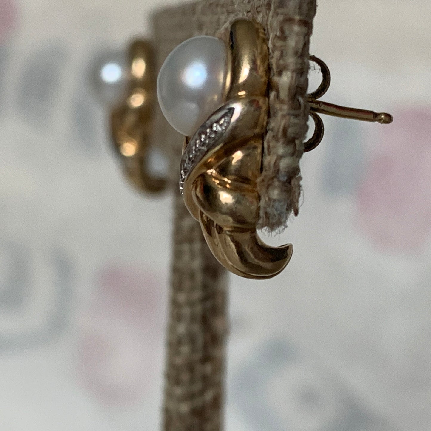 A pair of vintage pearl earrings