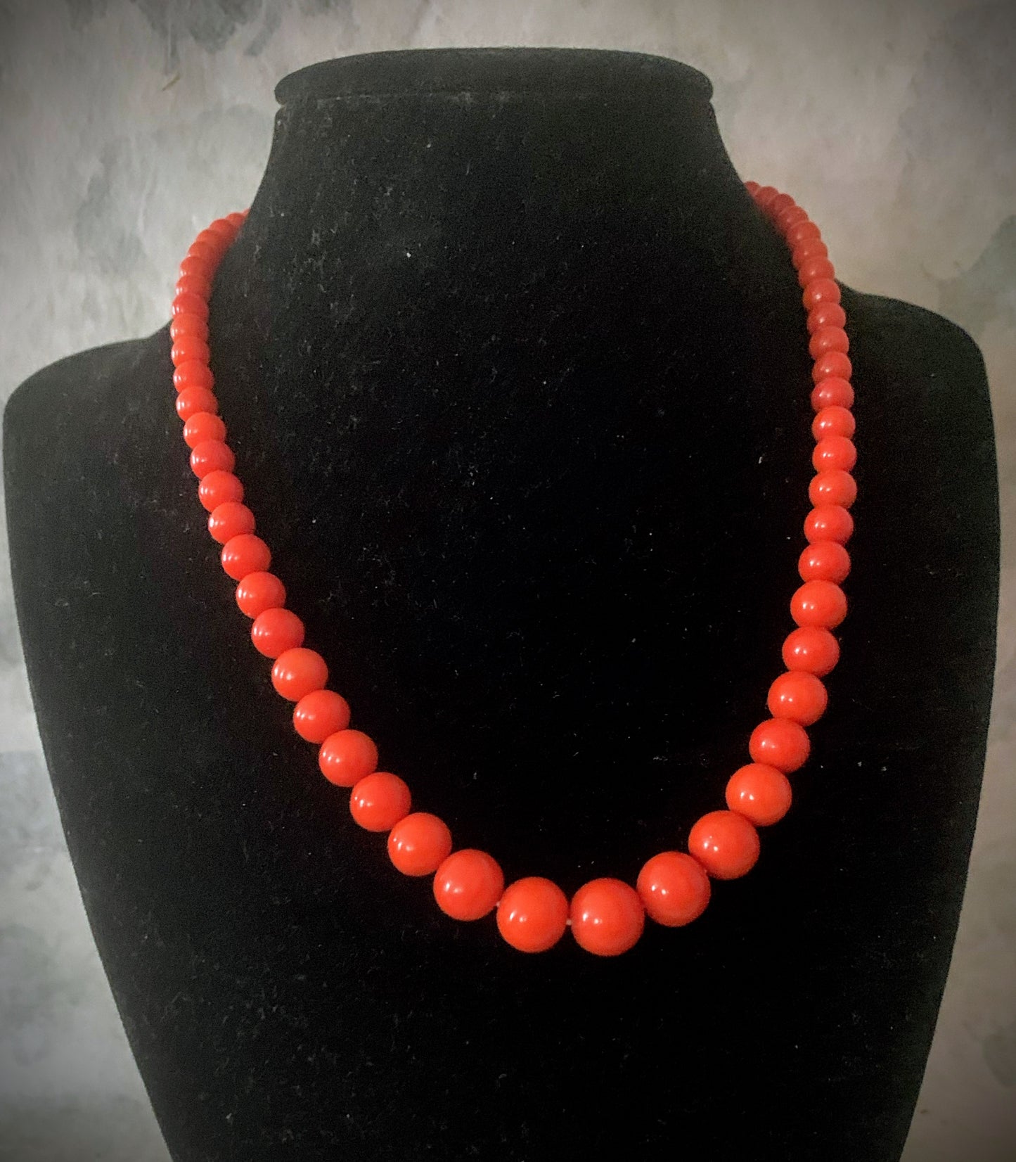 A 16” long antique coral necklace