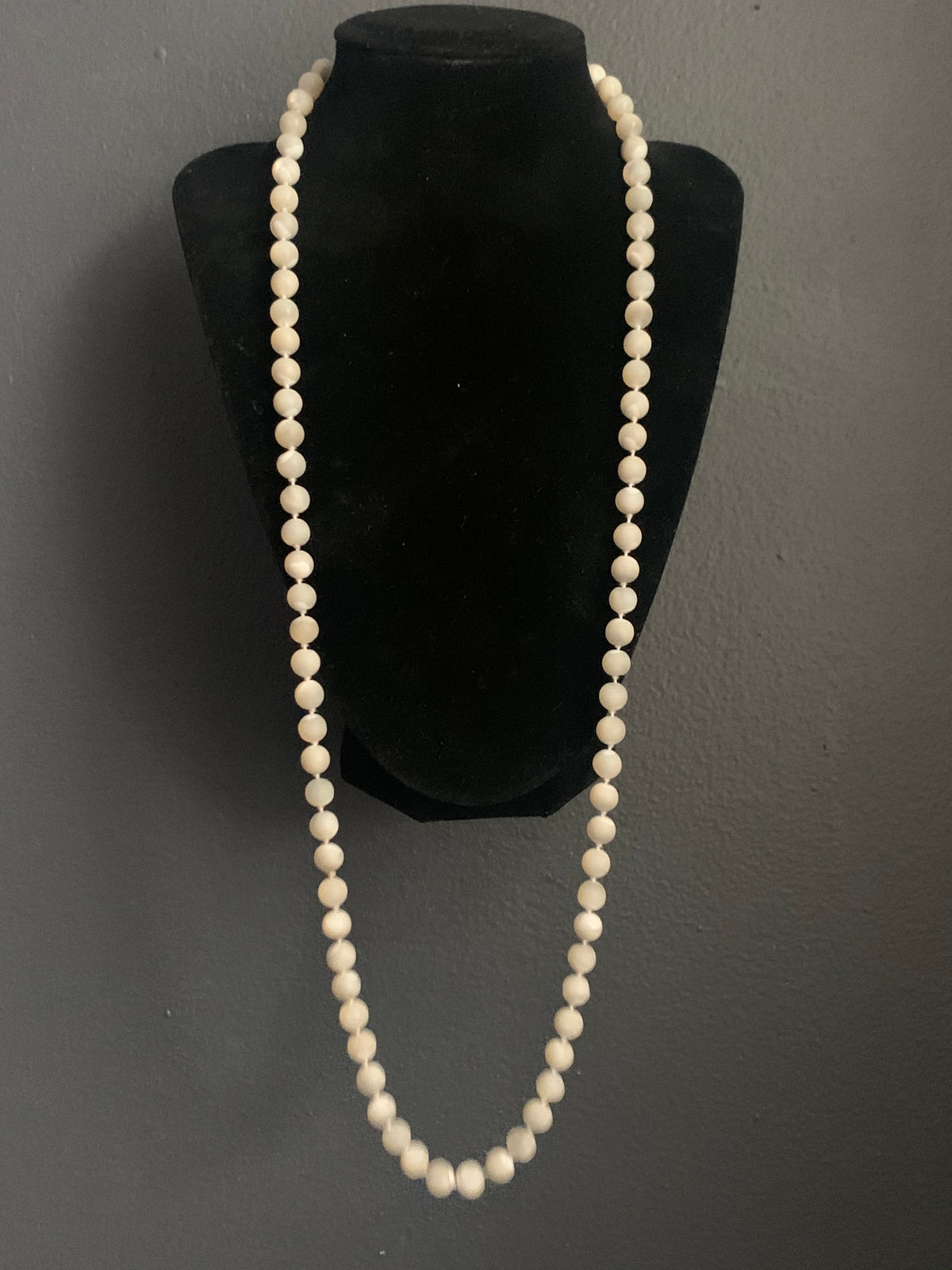 A mother of pearl necklace