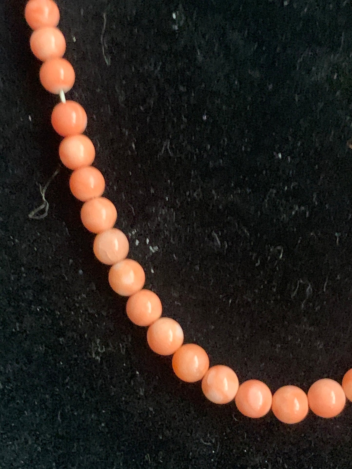 A salmon color coral necklace