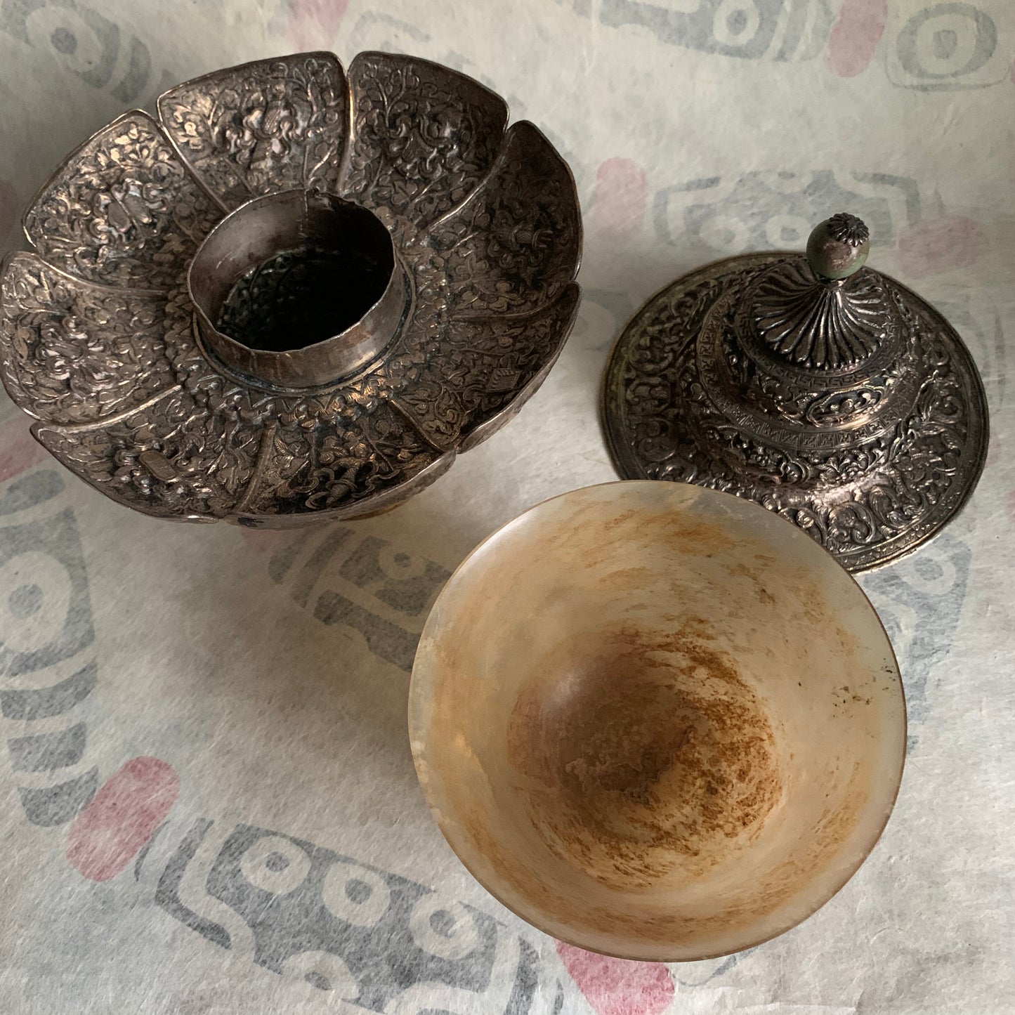 A silver Tibetan cup stand