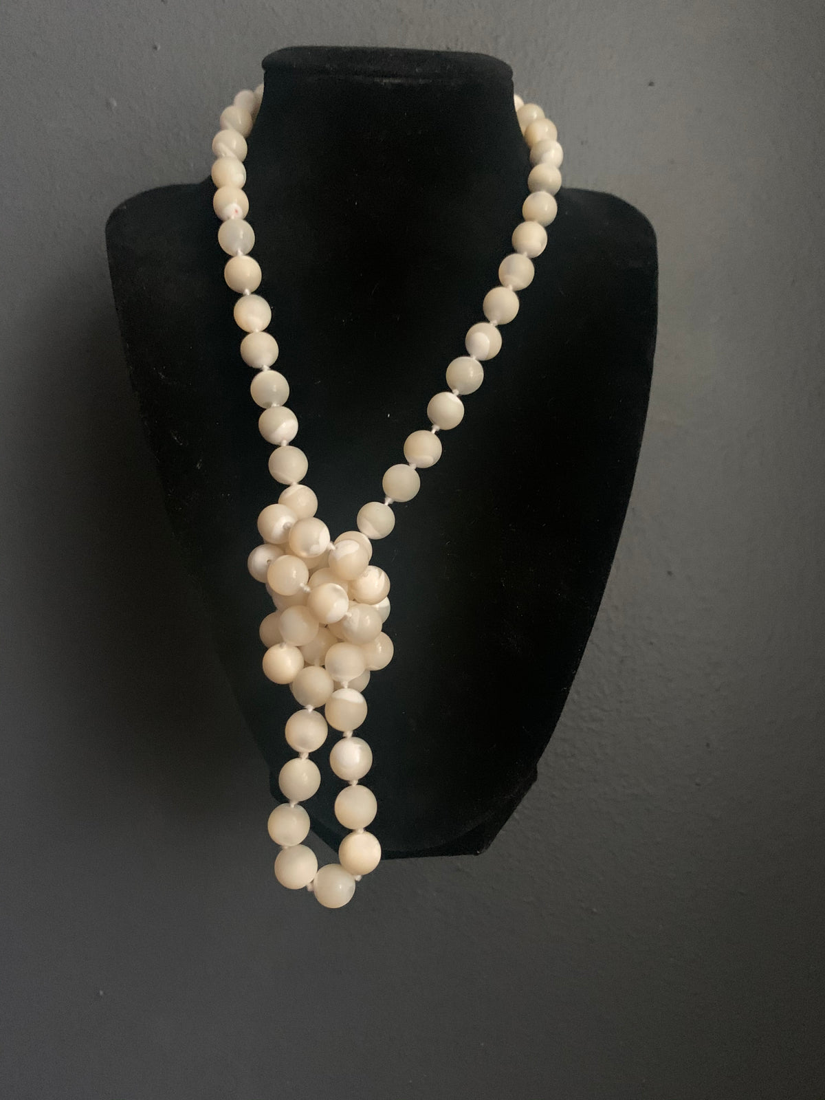A mother of pearl necklace