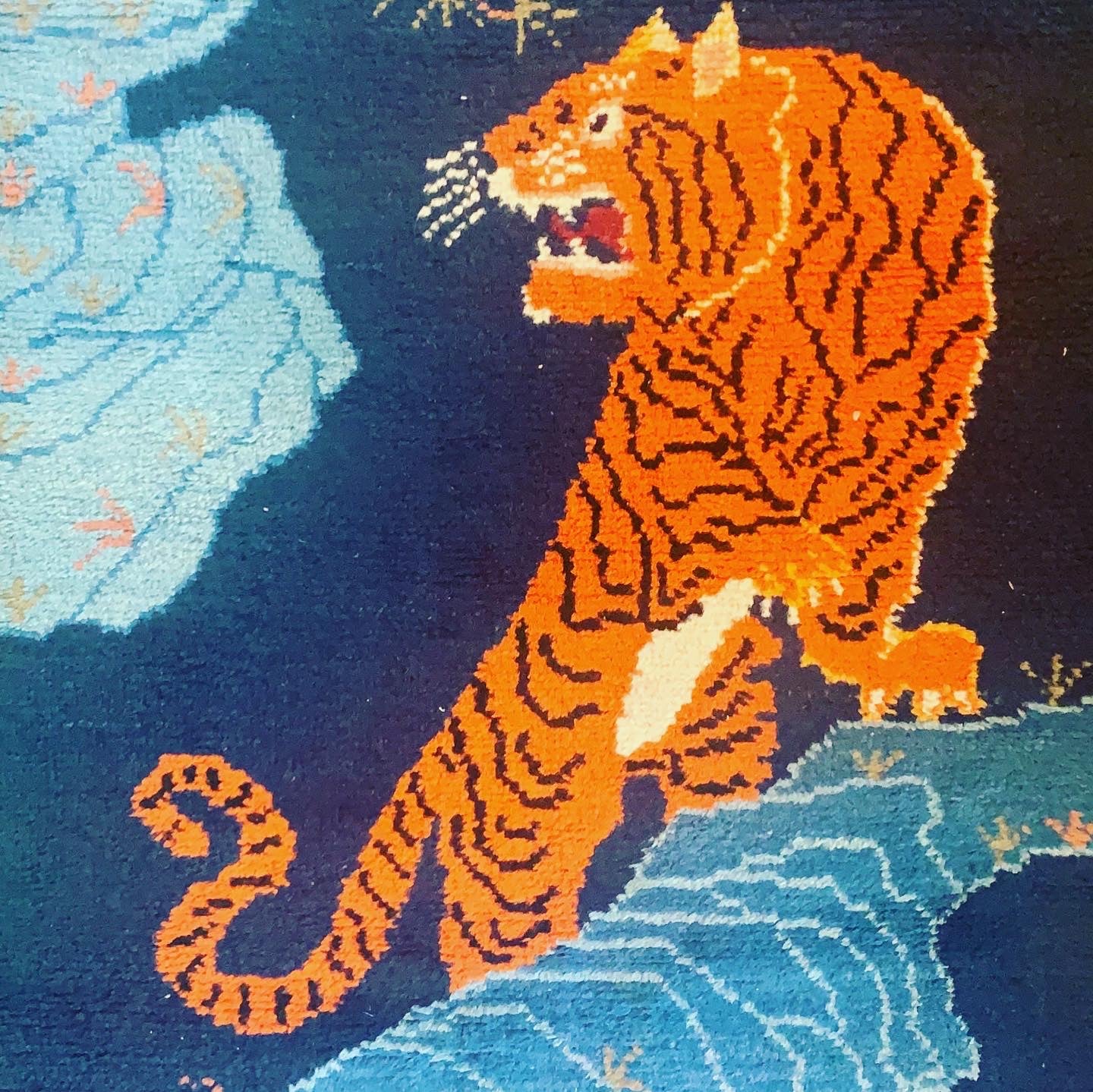 A vintage Tibetan Tiger carpet