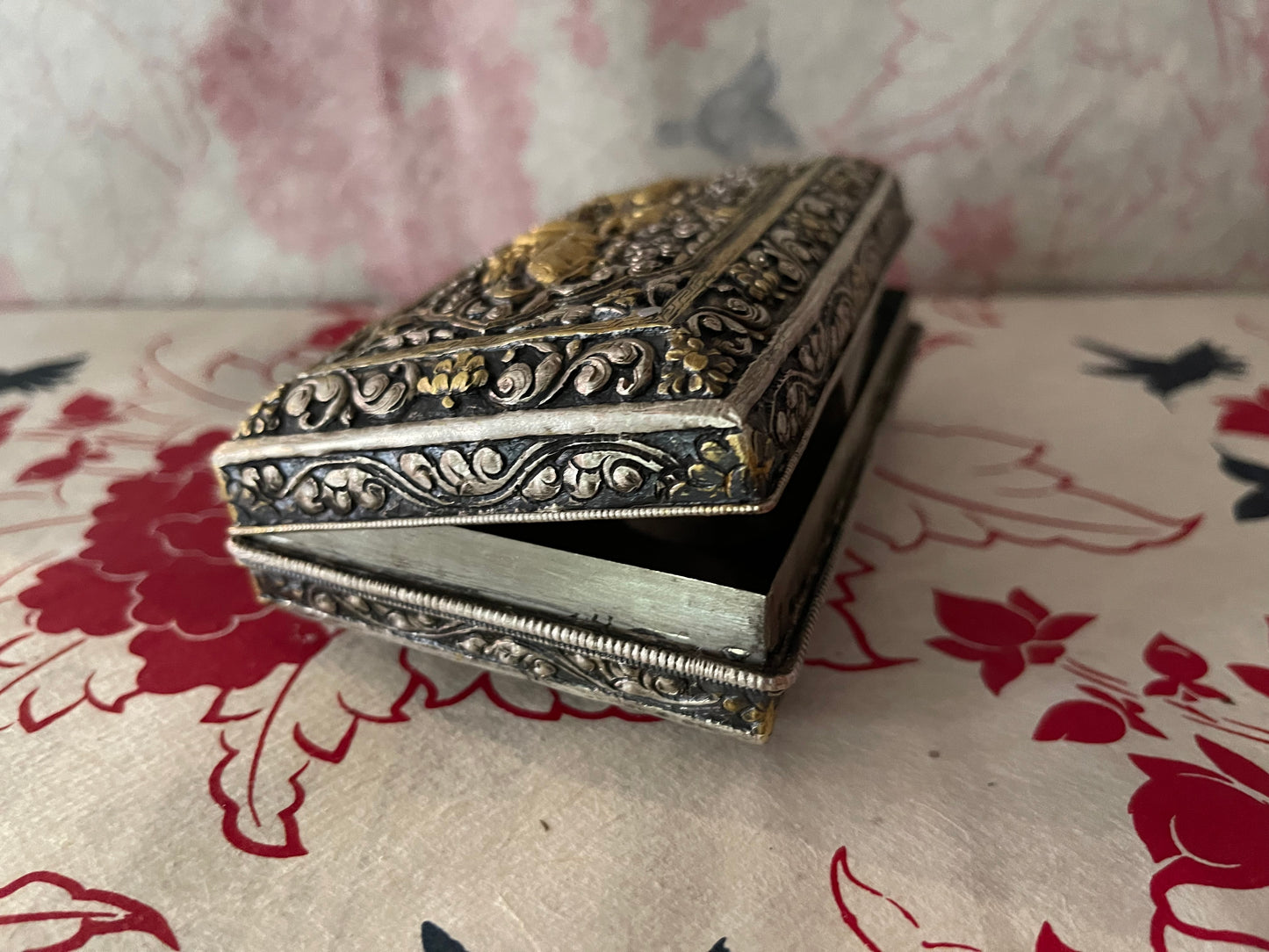 An antique carved Silver and gilded silver Bhutanese betel nut box