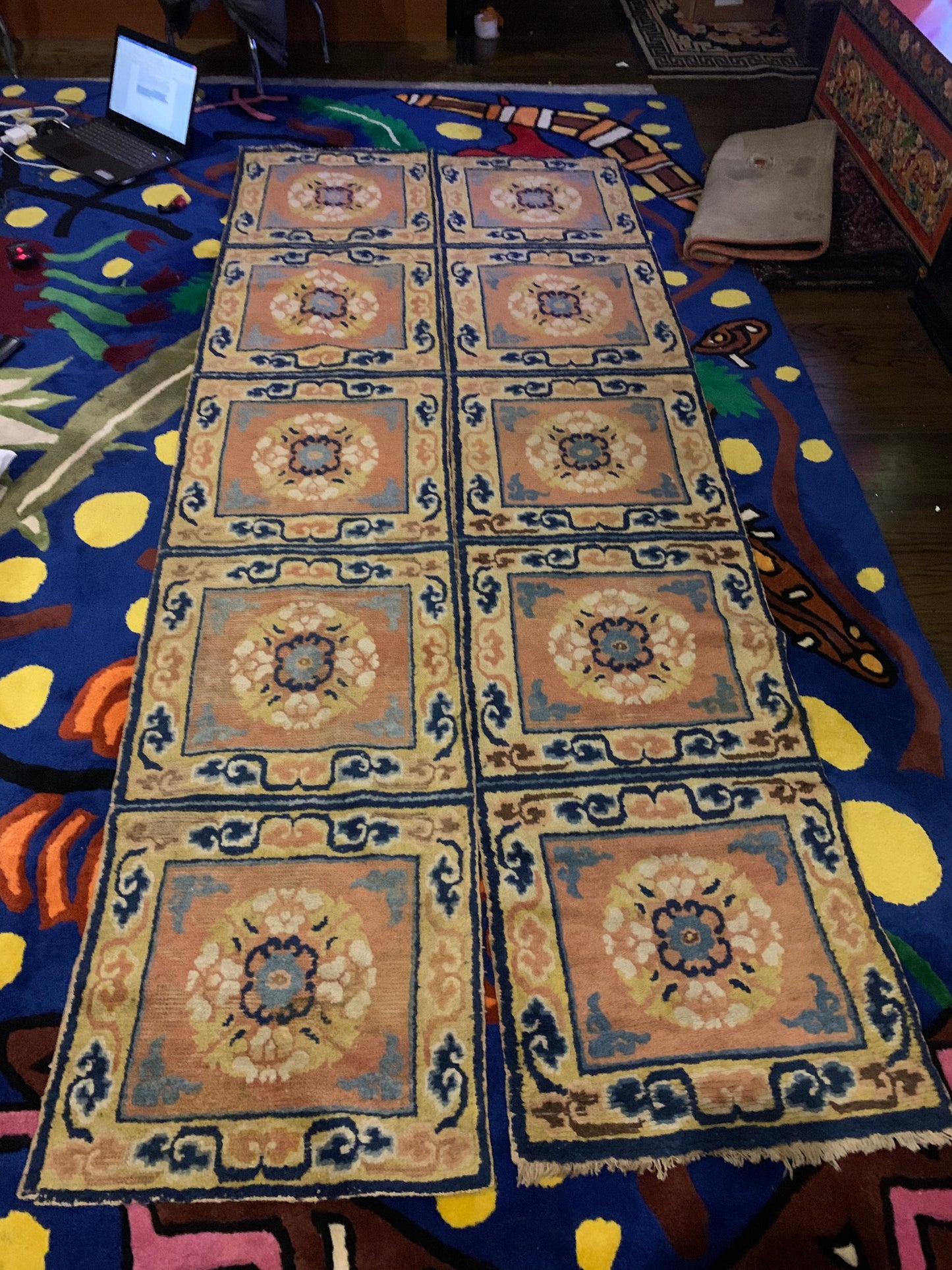 A pair of antique monastery runner carpets