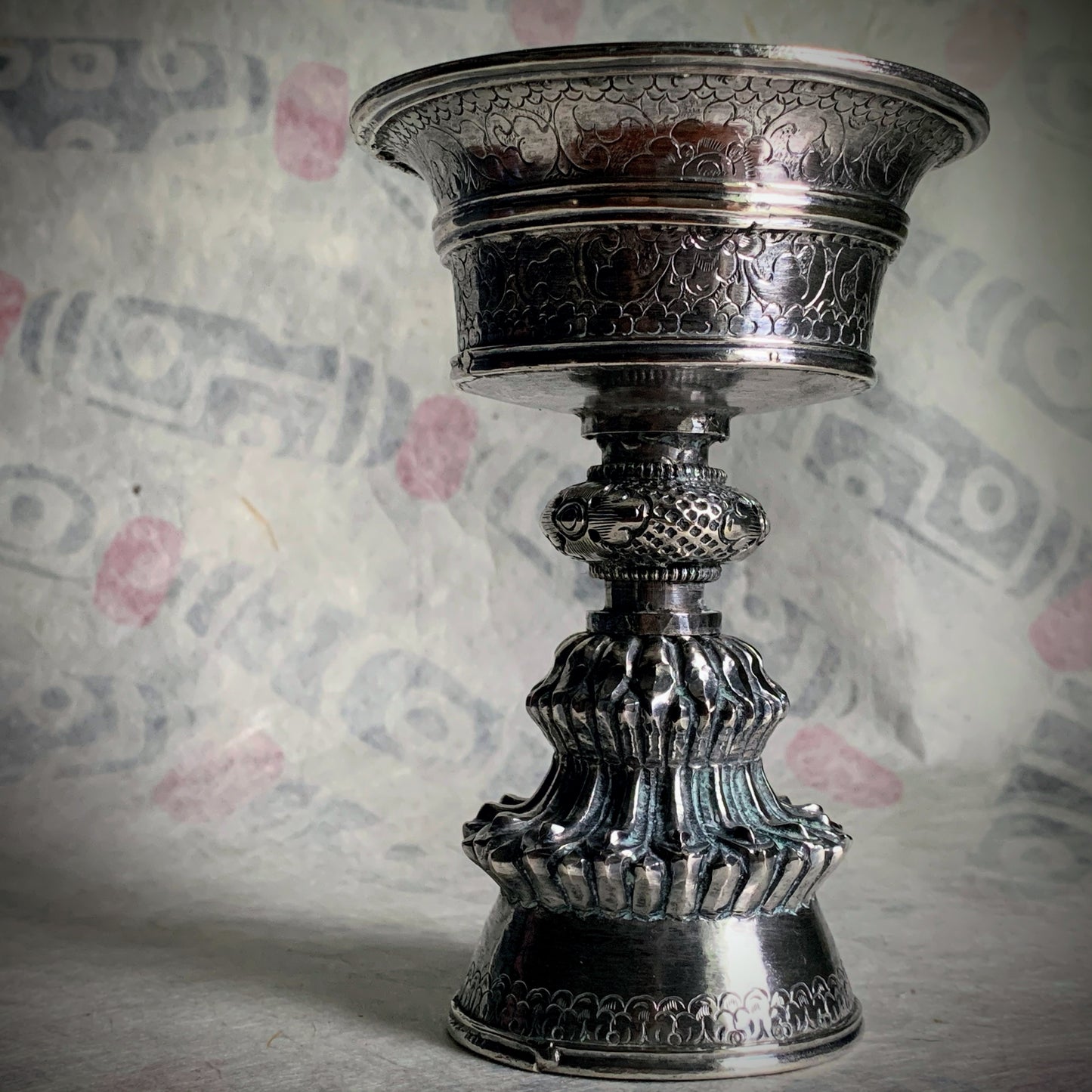 A silver Tibetan butterlamp