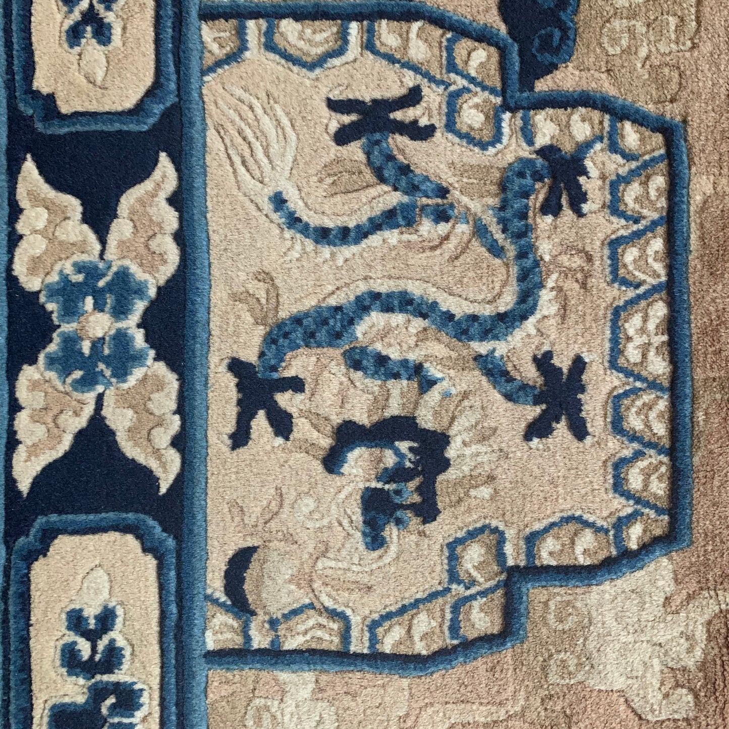 An antique ningxia dragon rug
