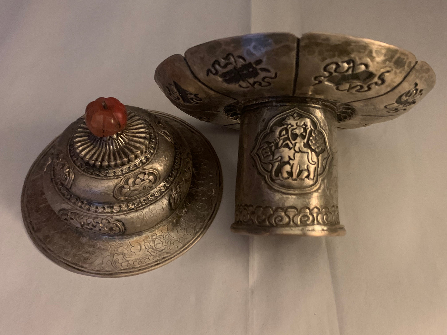 A silver Tibetan cup stand