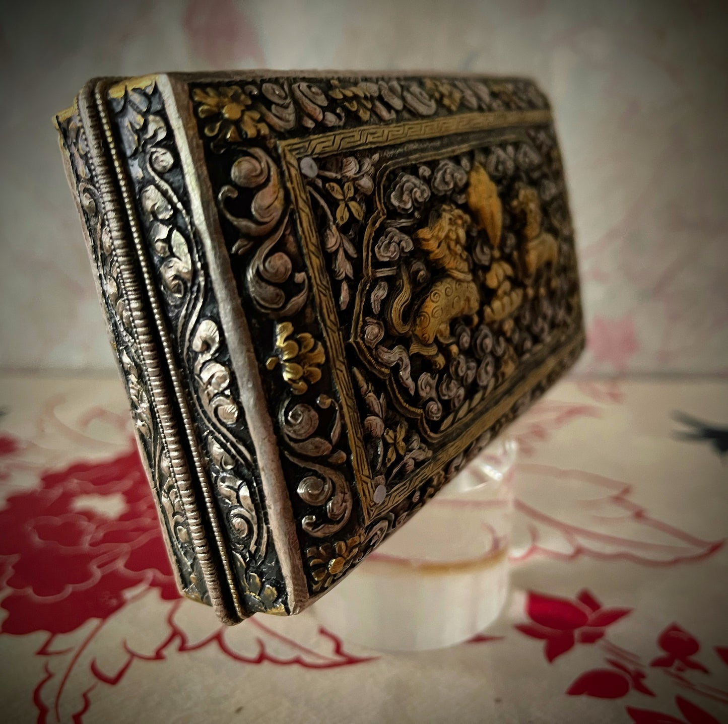 An antique carved Silver and gilded silver Bhutanese betel nut box
