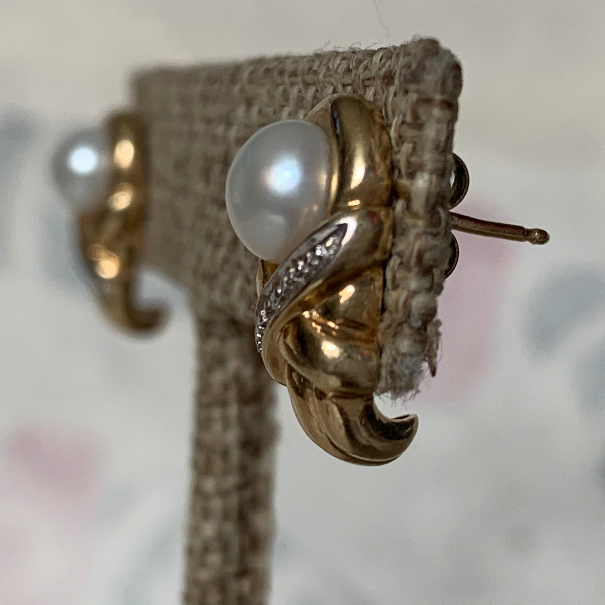 A pair of vintage pearl earrings